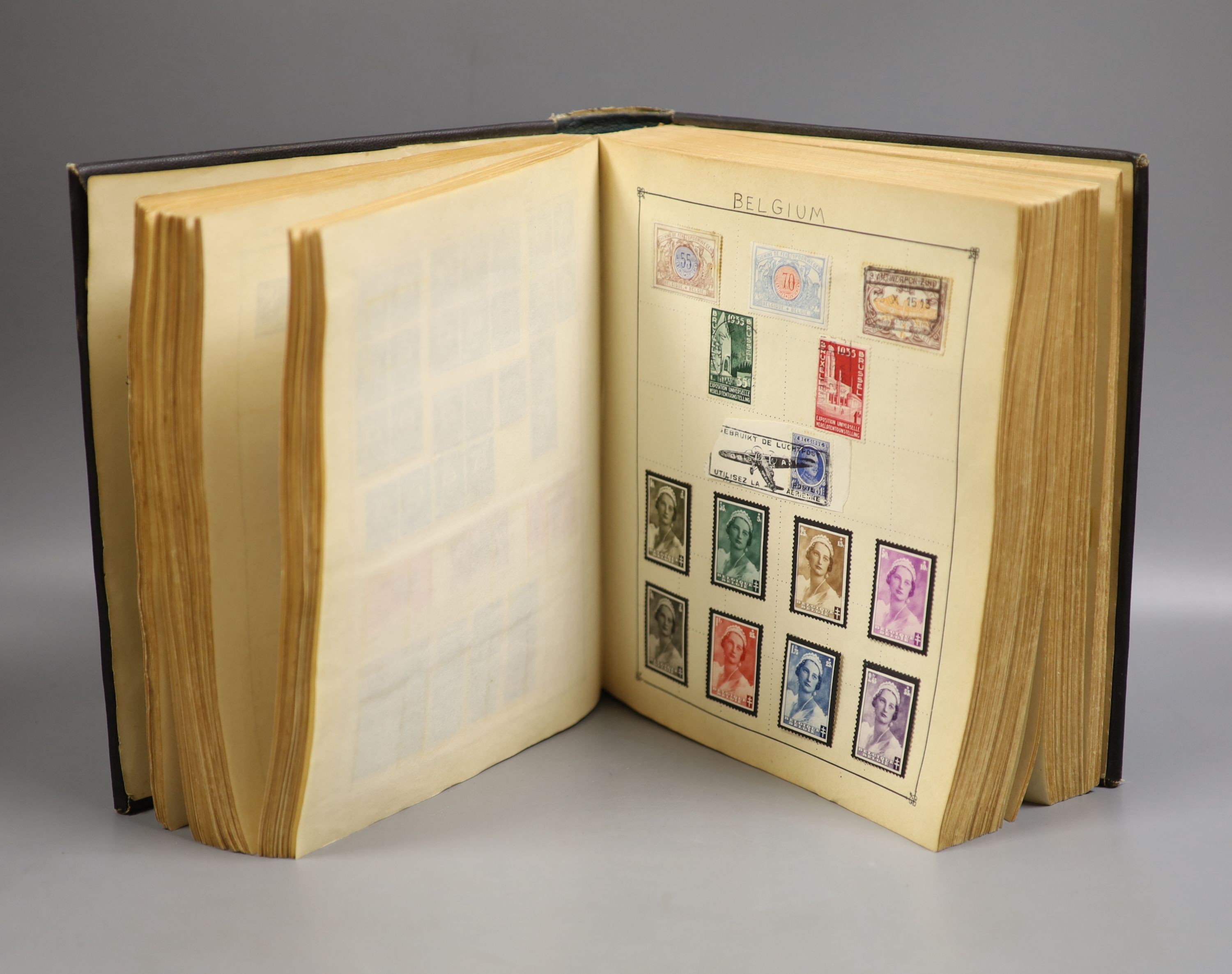 A Strand album of world stamps, 19th/20th century, started in 1931 including some unused stamps                                                                                                                             