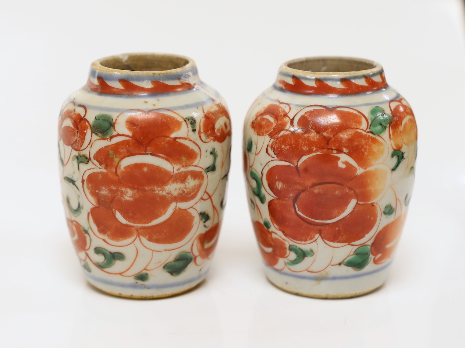 A pair of Chinese Transitional wucai jars, c. 1640, 9.5cms high                                                                                                                                                             