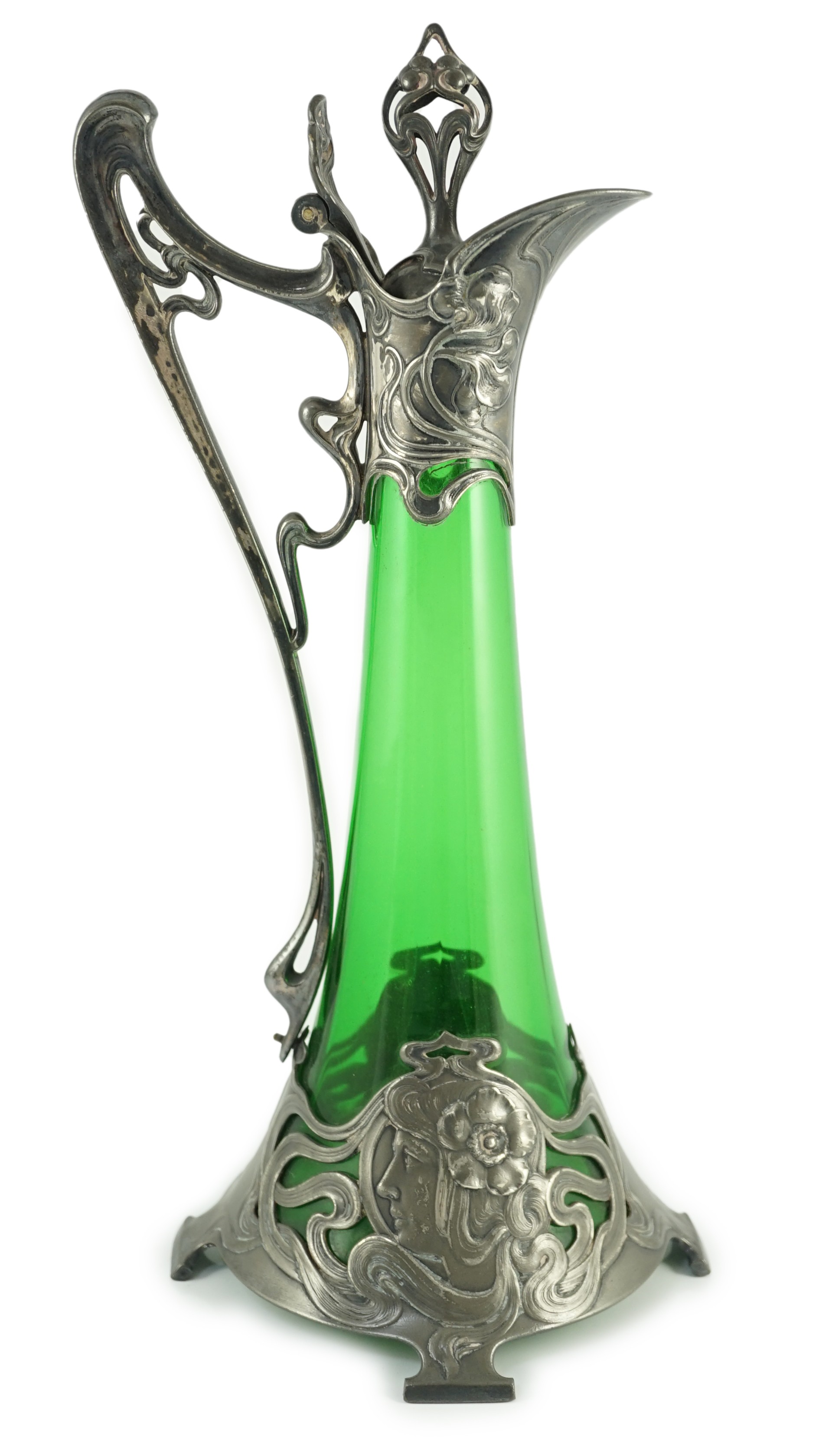 An Art Nouveau WMF metal mounted green glass ewer, c.1905, 40.5cm high                                                                                                                                                      