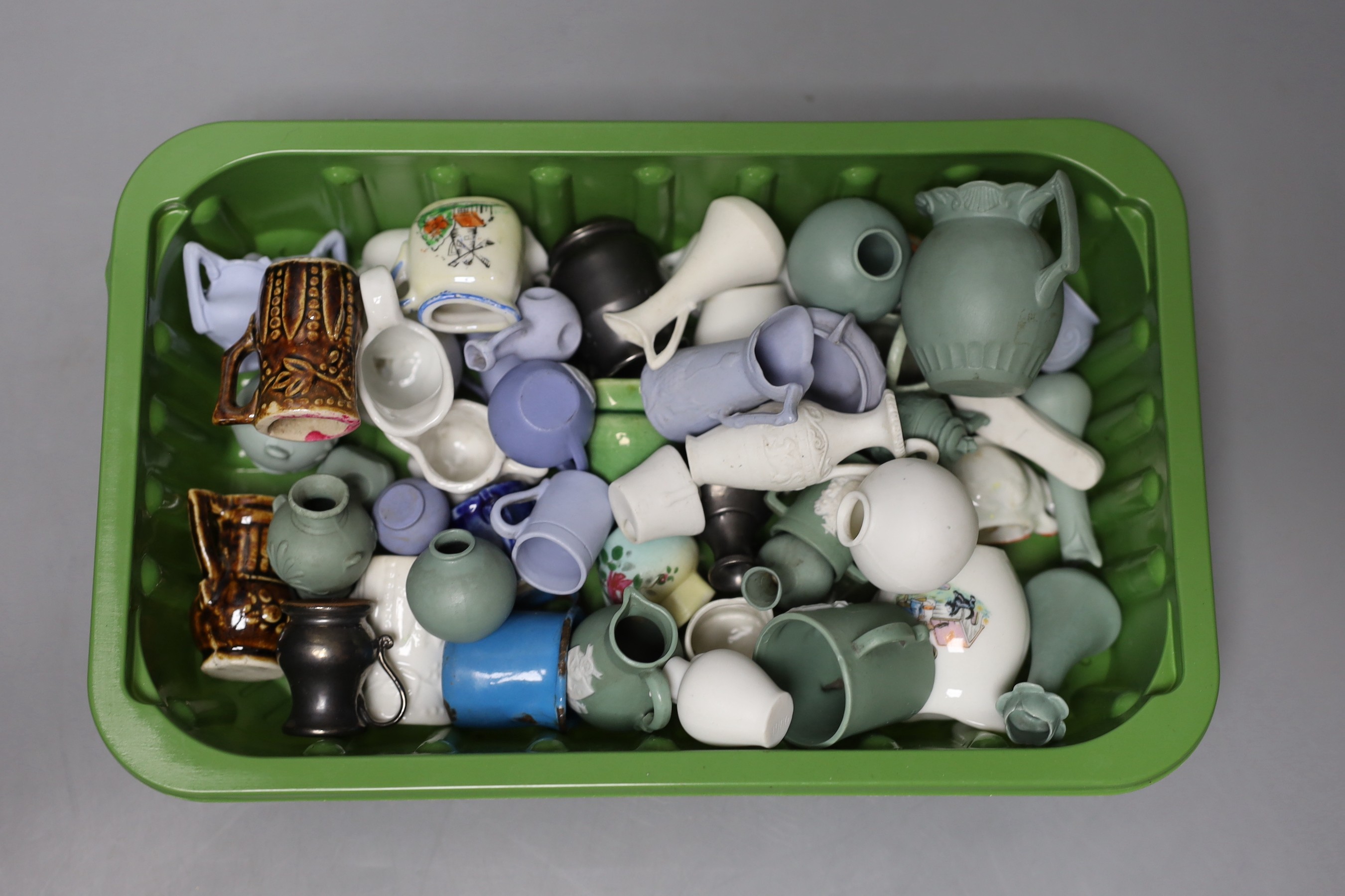 A quantity of miniature jugs                                                                                                                                                                                                