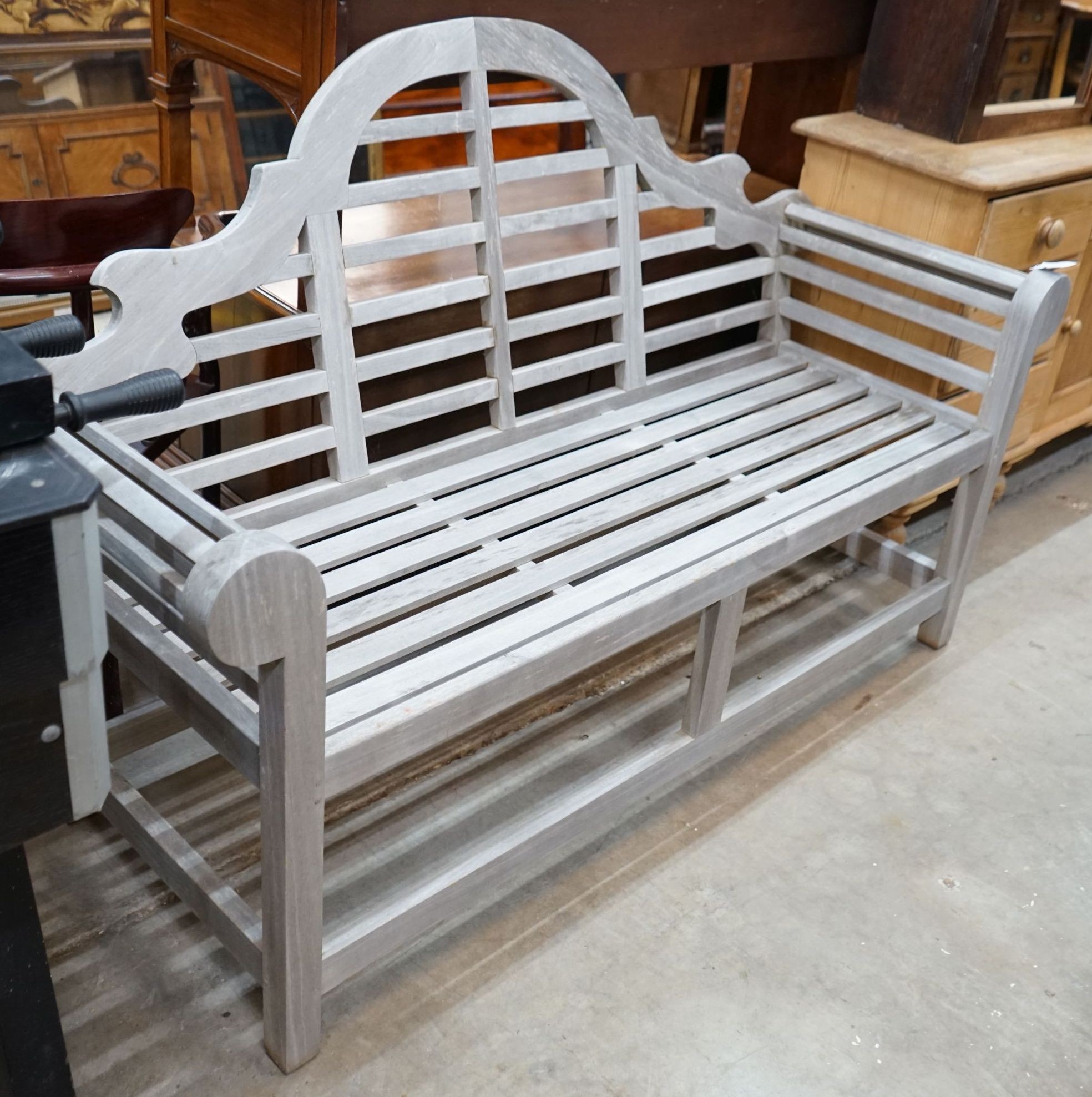 A Lutyens style weathered teak garden bench, width 166cm, depth 52cm, height 108cm                                                                                                                                          