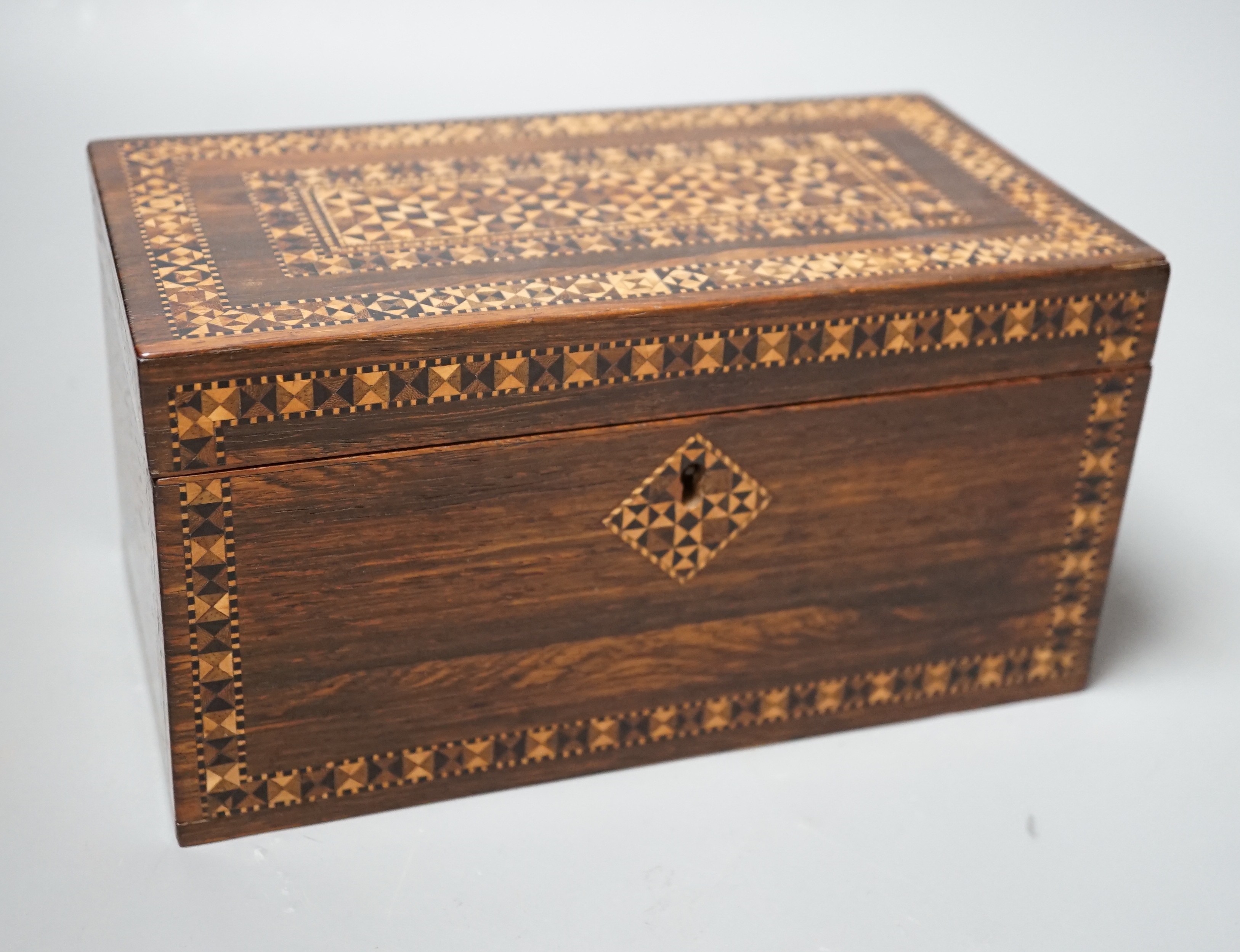 A Tunbridge ware rosewood and half square mosaic tea caddy, c.1830, 21cm wide                                                                                                                                               