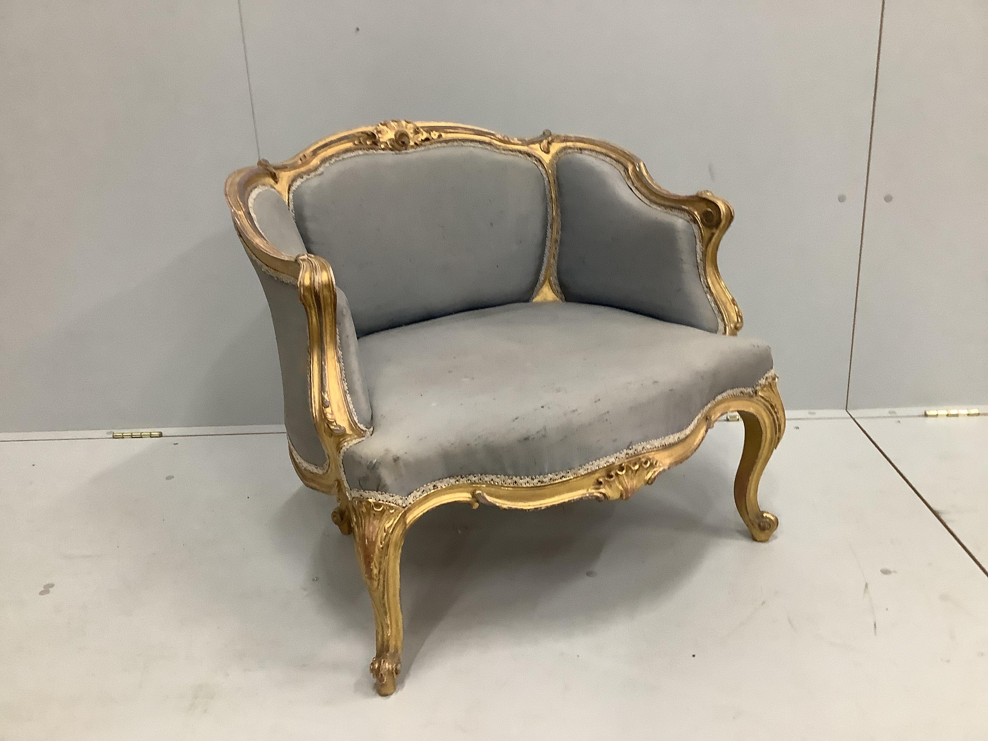 A Victorian carved giltwood and composition upholstered salon chair, width 70cm, depth 60cm, height 67cm                                                                                                                    