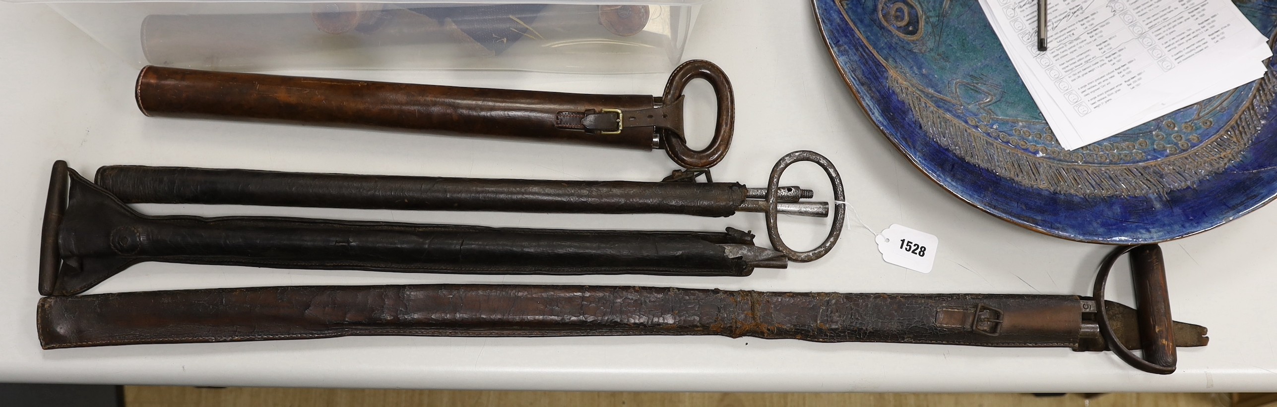 Four Victorian surveyors measuring rods, in leather cases                                                                                                                                                                   