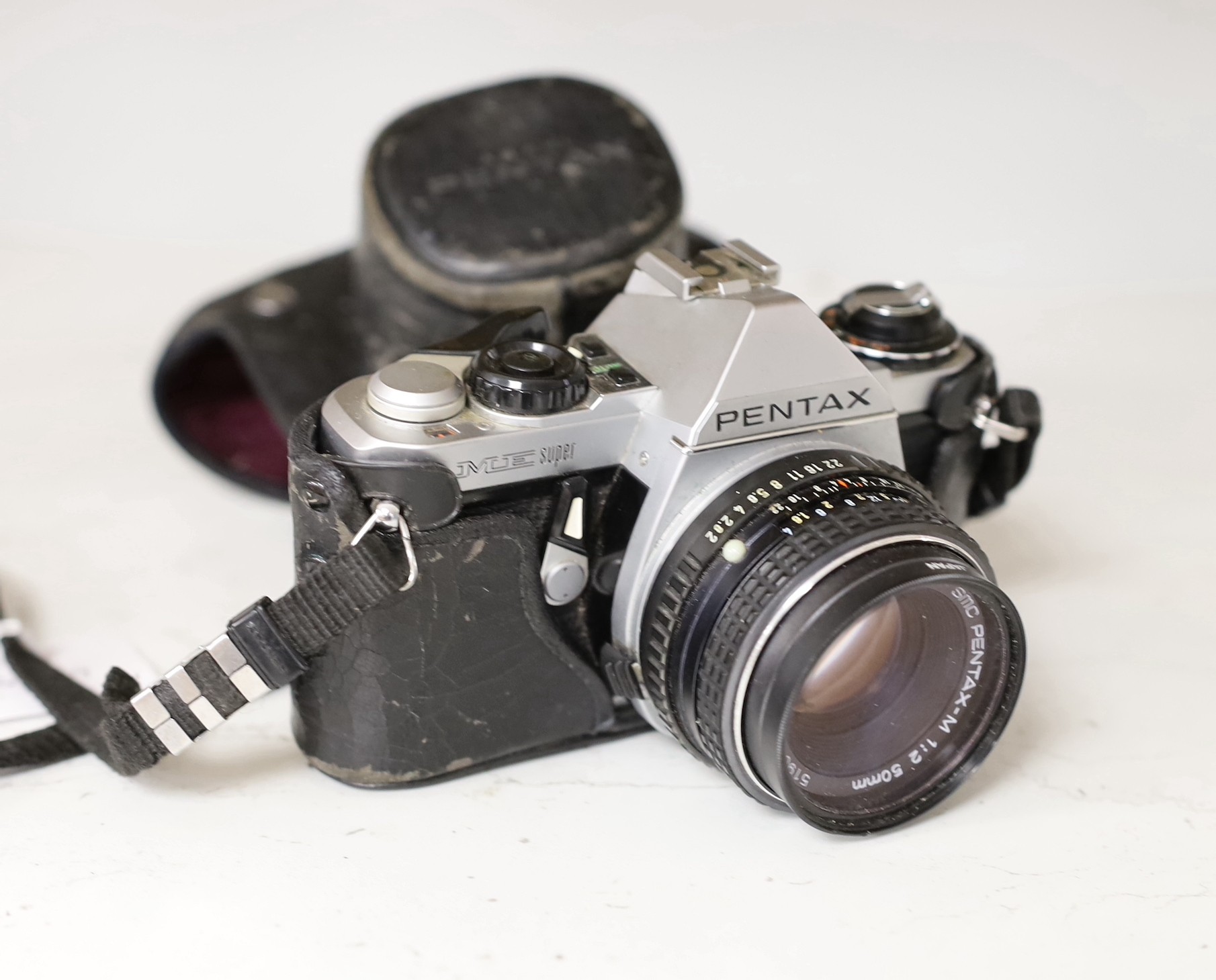 A Pentax ME Super SLR camera                                                                                                                                                                                                