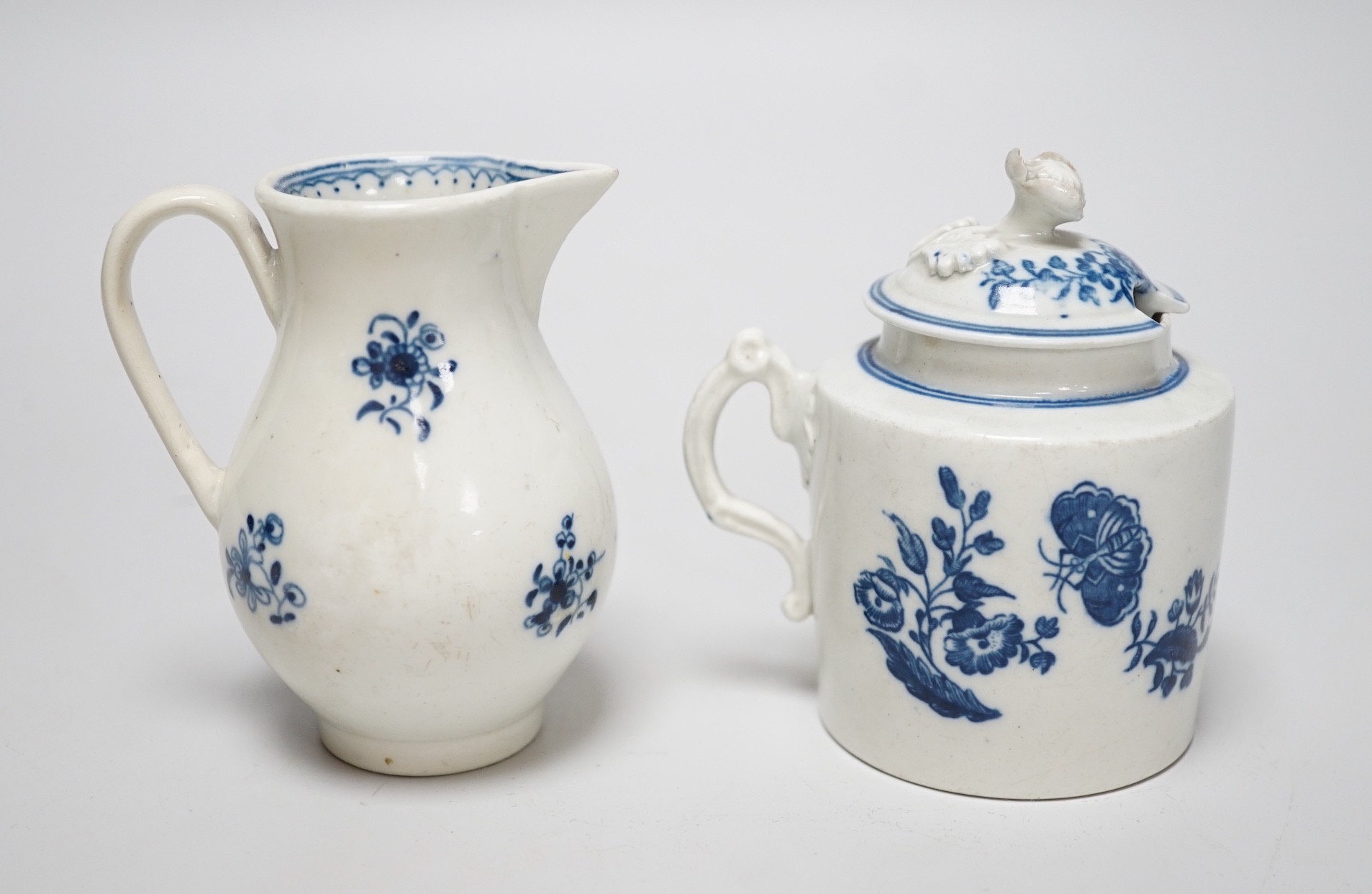 An 18th century Caughley rare sparrowbeak jug painted with the Waiting Chinaman pattern, handle repaired and a Caughley mustard pot and cover with 'Three Flowers', jug 9cms high                                           