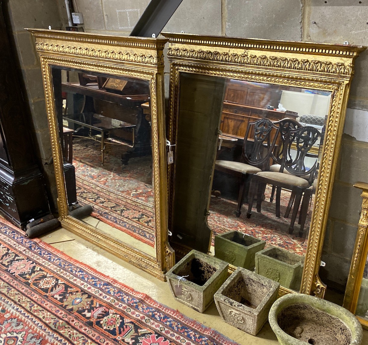 A pair of 19th century giltwood and composition overmantel mirrors, width 114cm, height 120cm                                                                                                                               