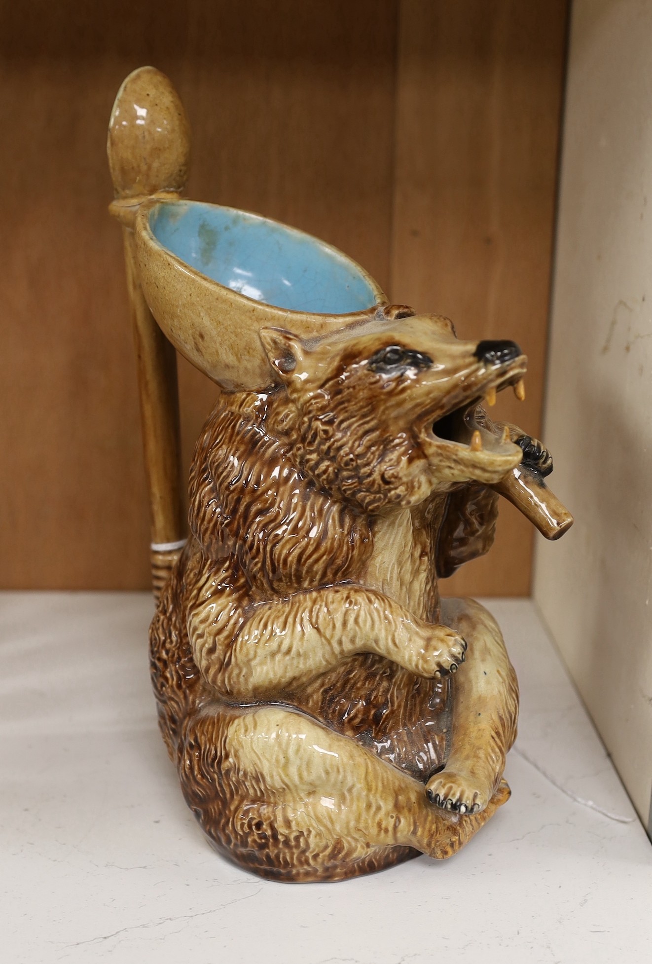 A Continental Majolica ‘bear’ jug. 26.5cm tall                                                                                                                                                                              