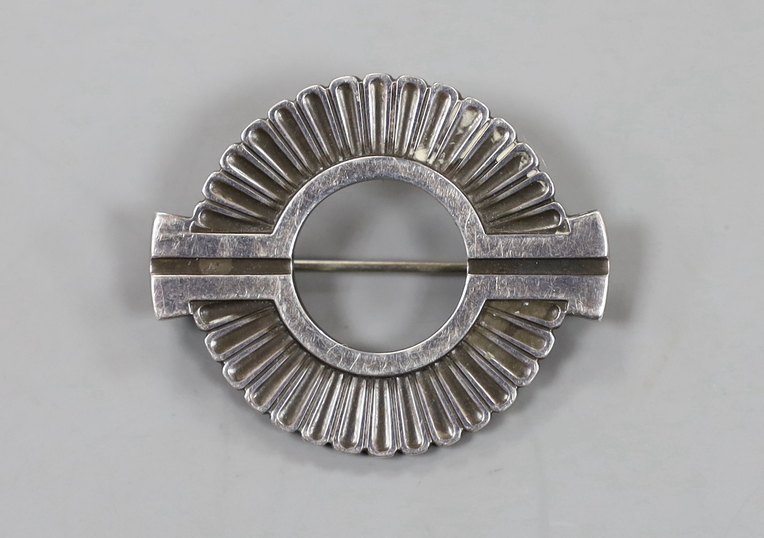 A Georg Jensen sterling 925 studio art brooch, of openwork circular form, design no. 310, 33mm.                                                                                                                             