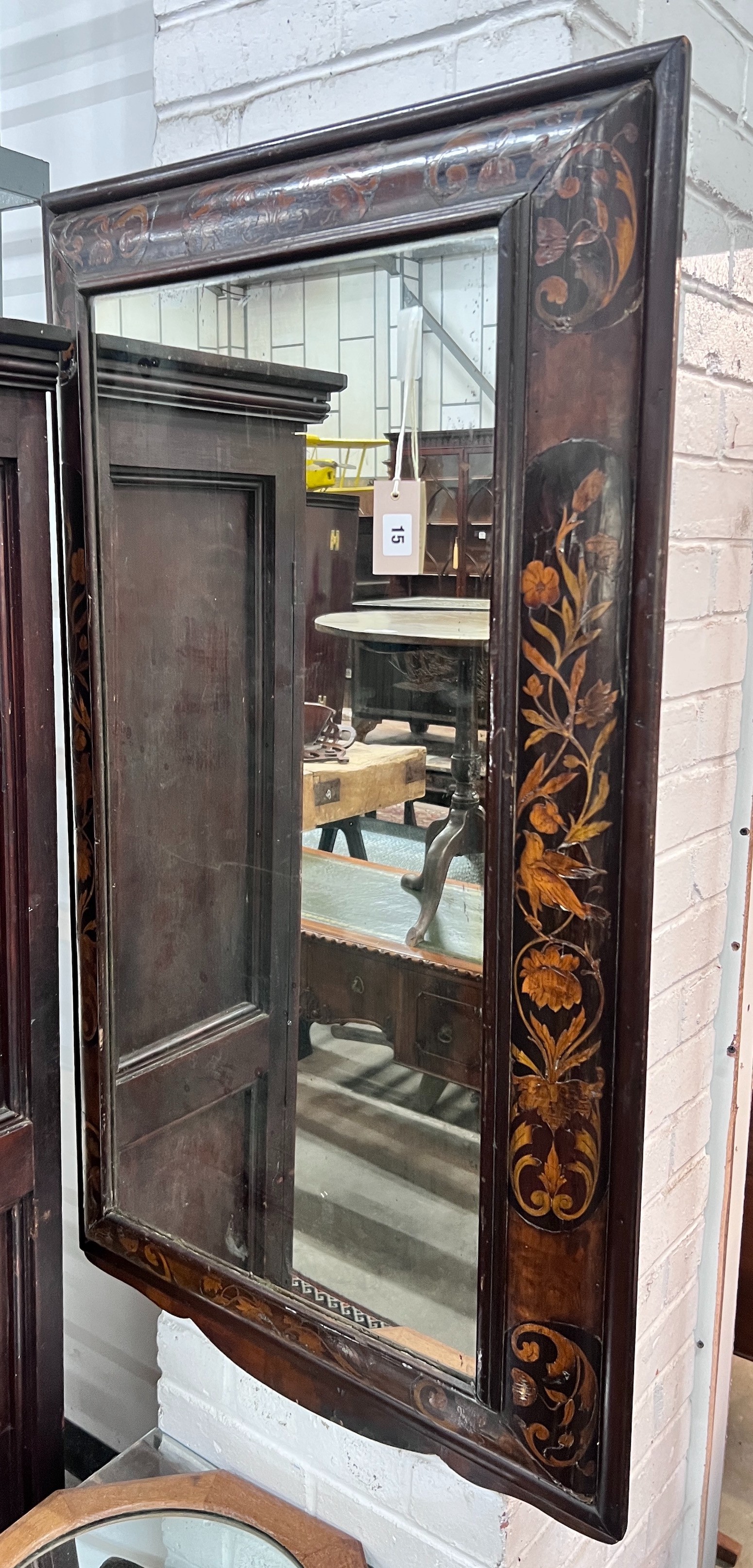 A William and Mary style marquetry inlaid rectangular walnut cushion framed wall mirror, width 66cm, height 120cm *Please note the sale commences at 9am.                                                                   