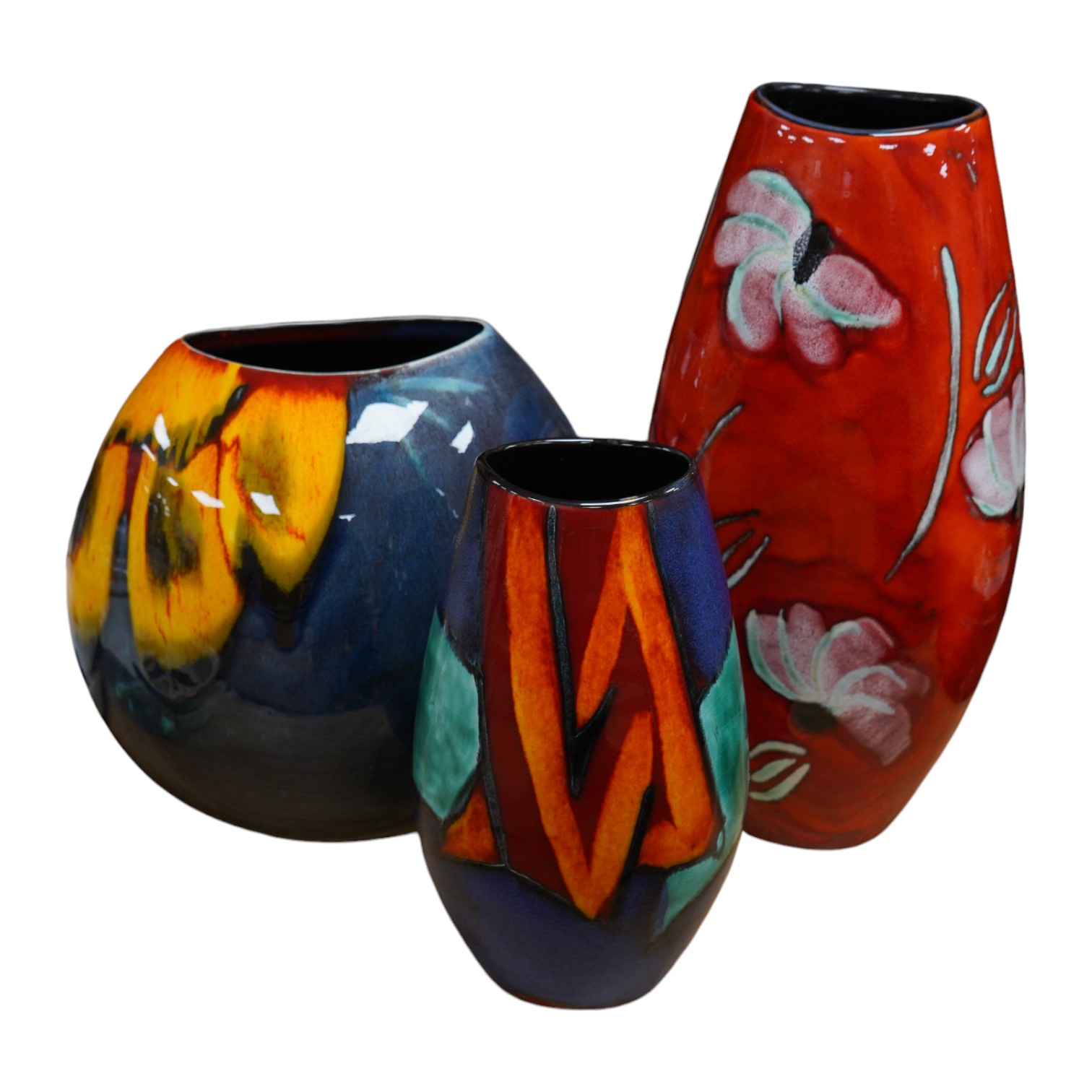 A Poole Purse vase and two Manhattan vases including a ‘daisy’ example, largest 37cm high. Condition - good                                                                                                                 