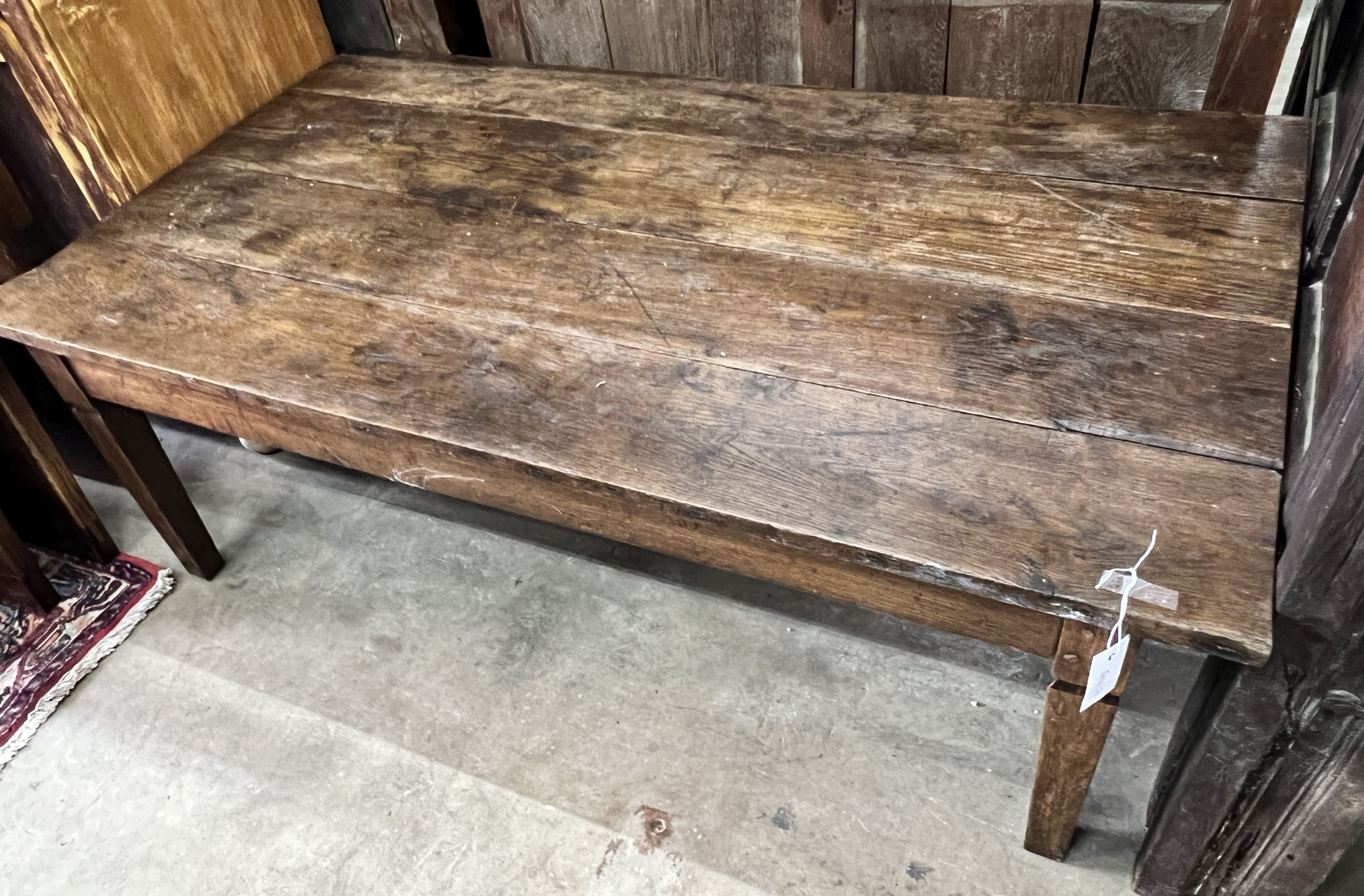 A 19th century French rectangular oak coffee table, length 134cm, depth 76cm, height 48cm (cut down dining table)                                                                                                           