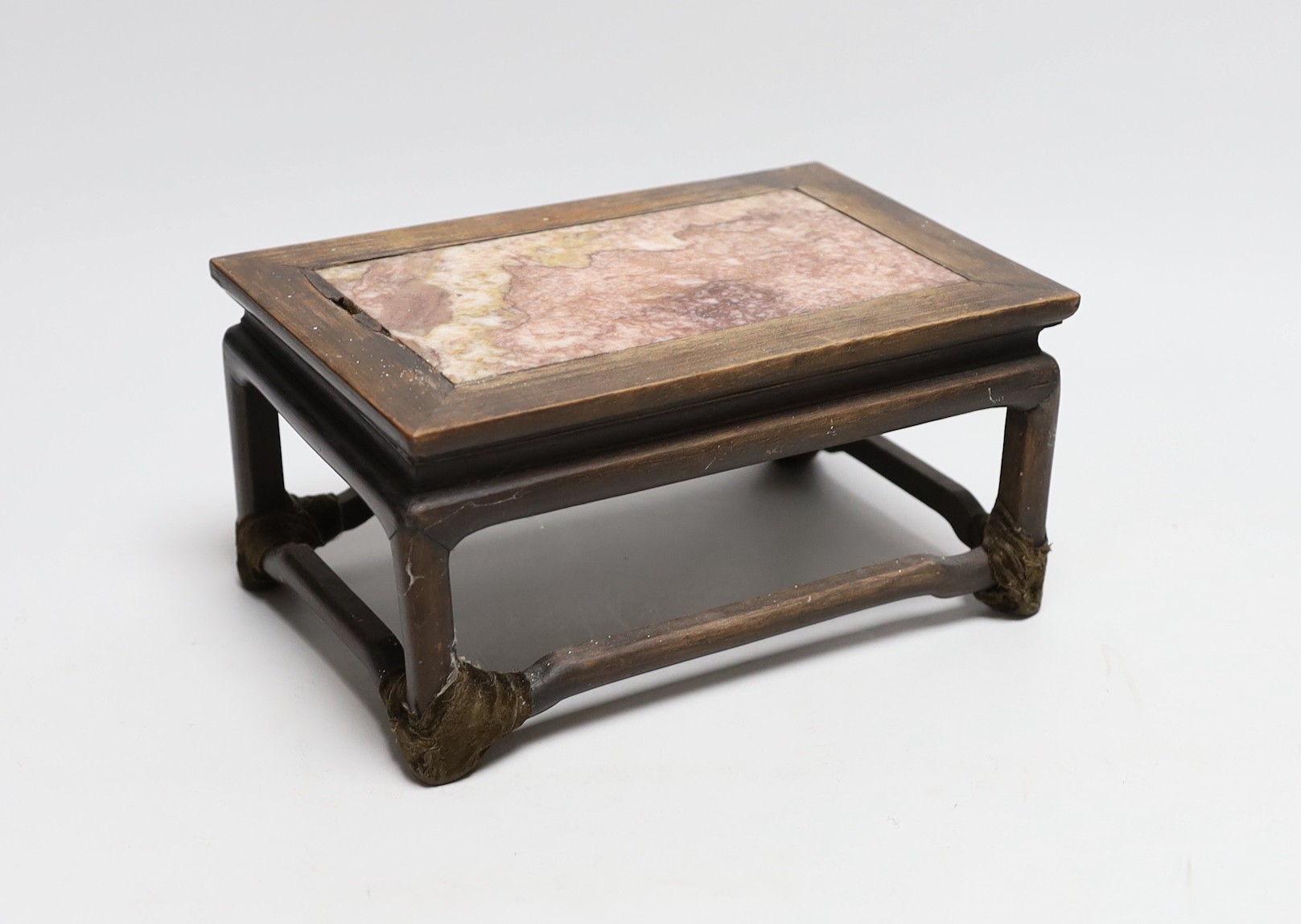 A small Chinese hongmu and marble inset stand, 21cm long                                                                                                                                                                    