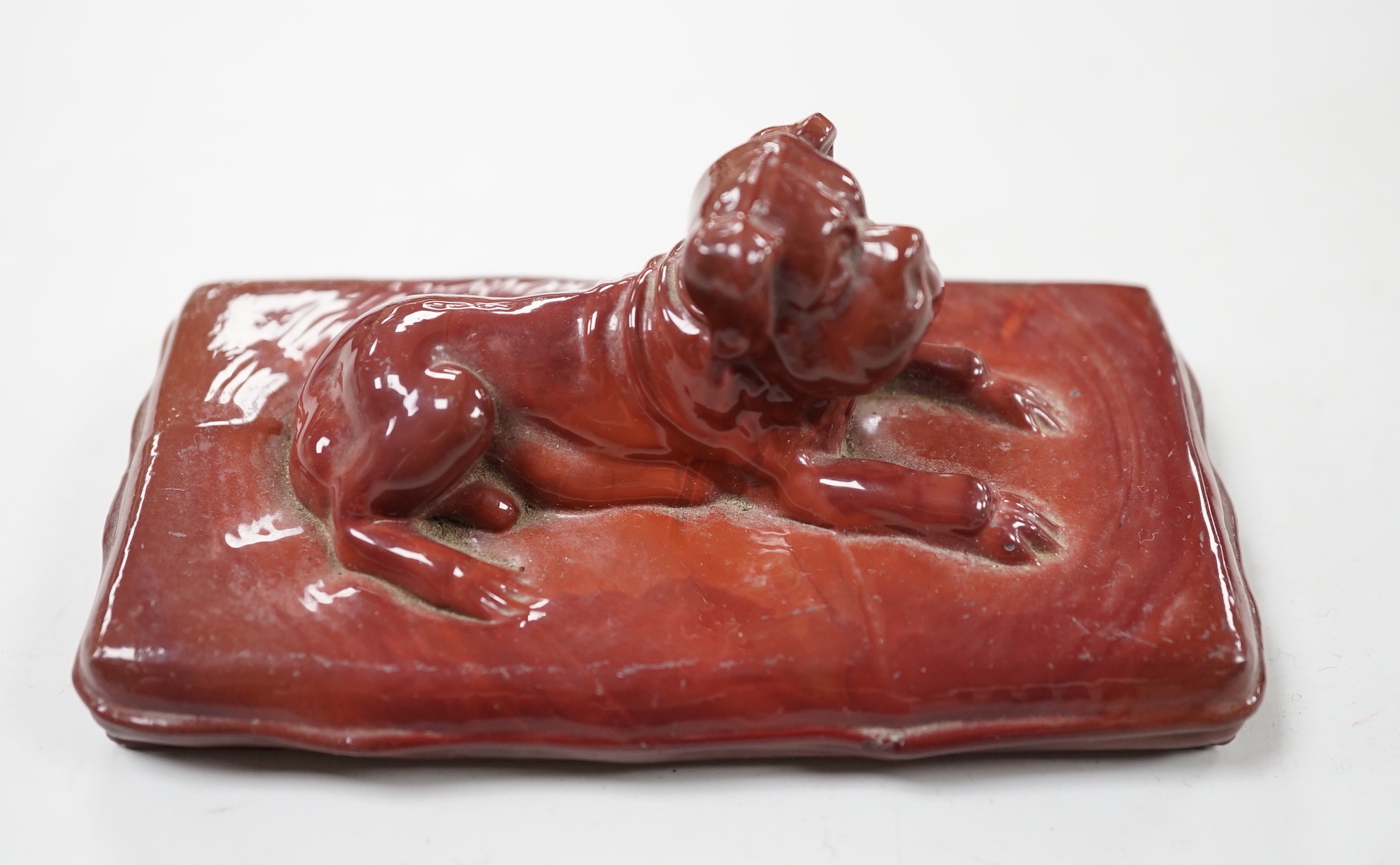 A German ‘agate’ glass model of a dog, 11.5cm wide                                                                                                                                                                          