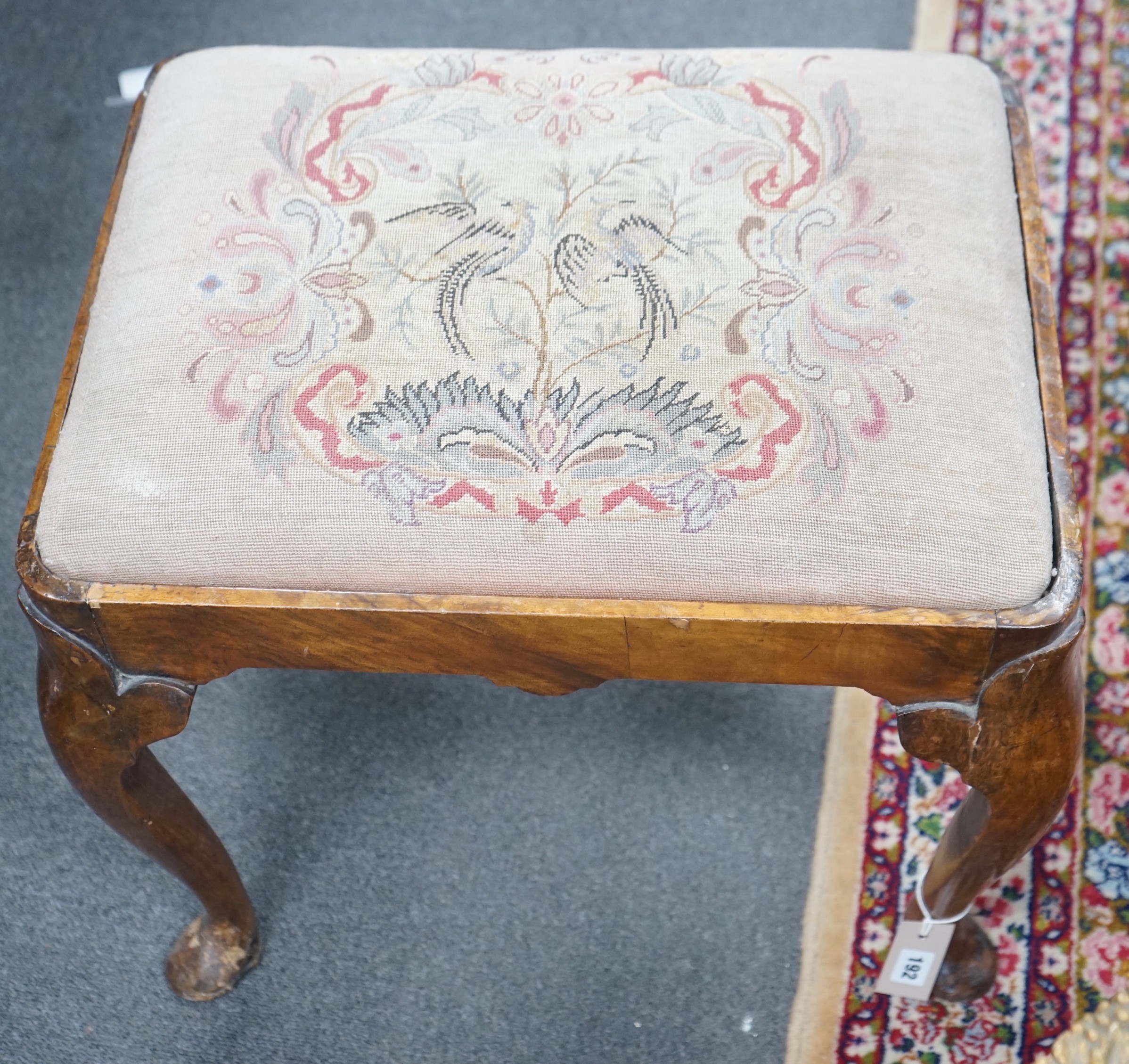 A Queen Anne revival walnut dressing stool, width 56cm, depth 45cm, height 48cm                                                                                                                                             