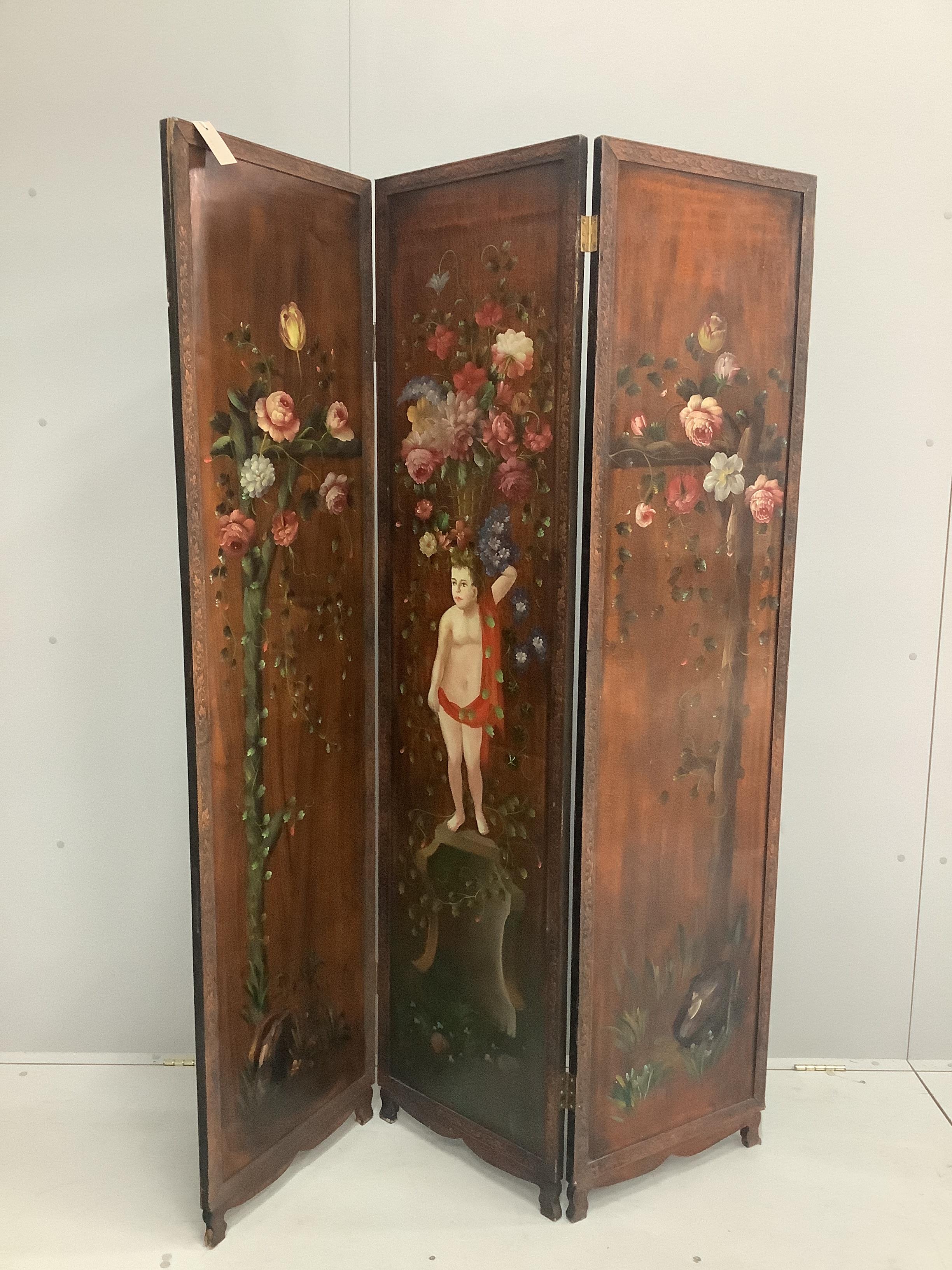 A painted three fold dressing screen, each panel width 45cm, height 176cm                                                                                                                                                   