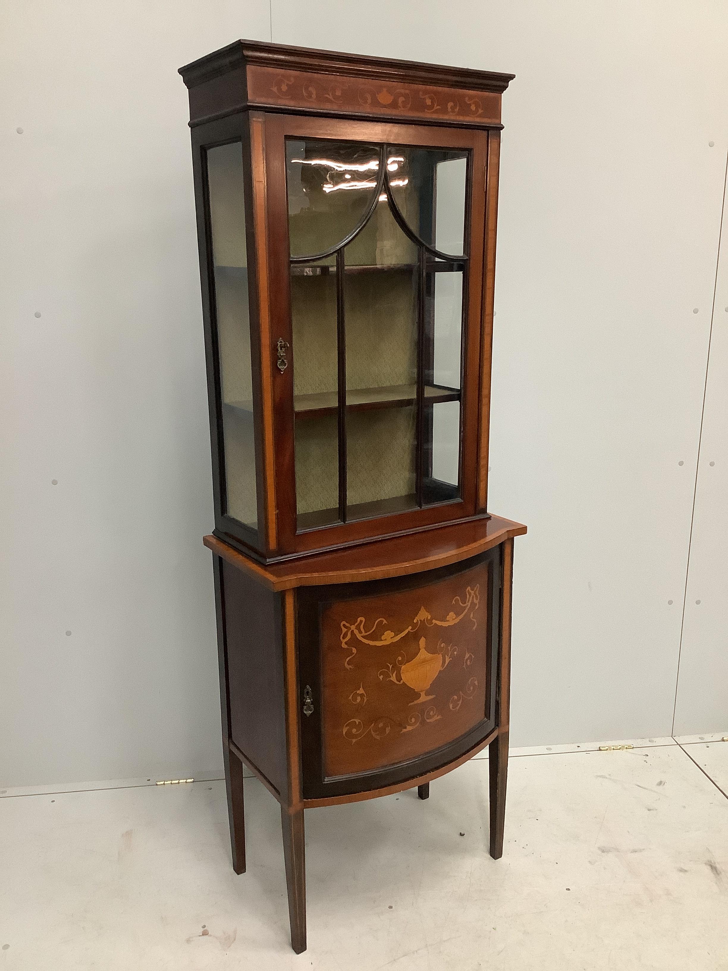 An Edwardian inlaid mahogany bowfront display cabinet, width 66cm, depth 42cm, height 185cm                                                                                                                                 