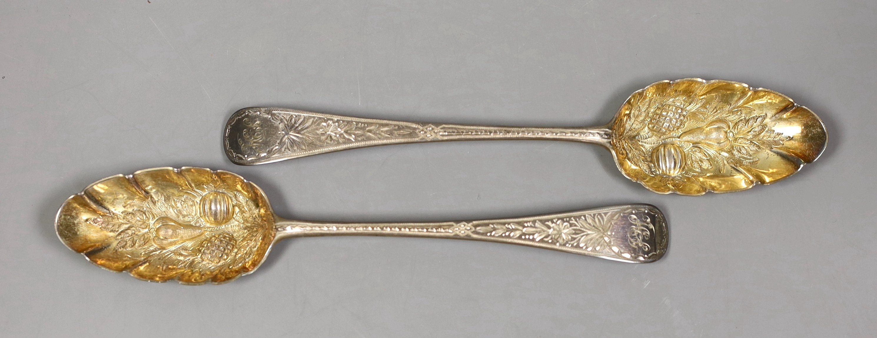 A pair of George III silver Old English pattern 'berry' spoons, Godbehere, Wigan & Bolt, London, 1803, 21.9cm, 132 grams.                                                                                                   