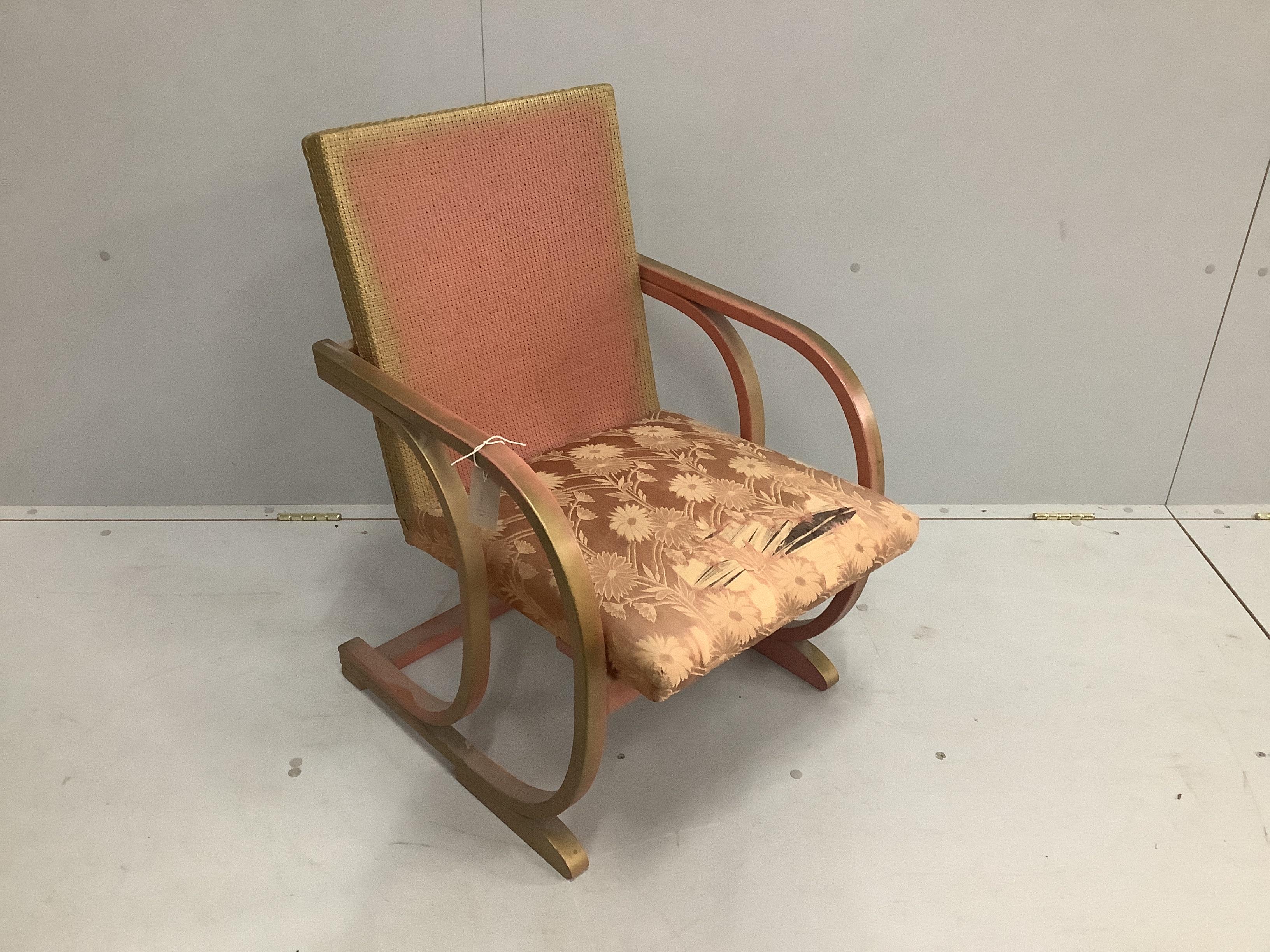 A Lloyd Loom adjustable chair with bentwood arms, width 52cm, depth 51cm, height 80cm                                                                                                                                       