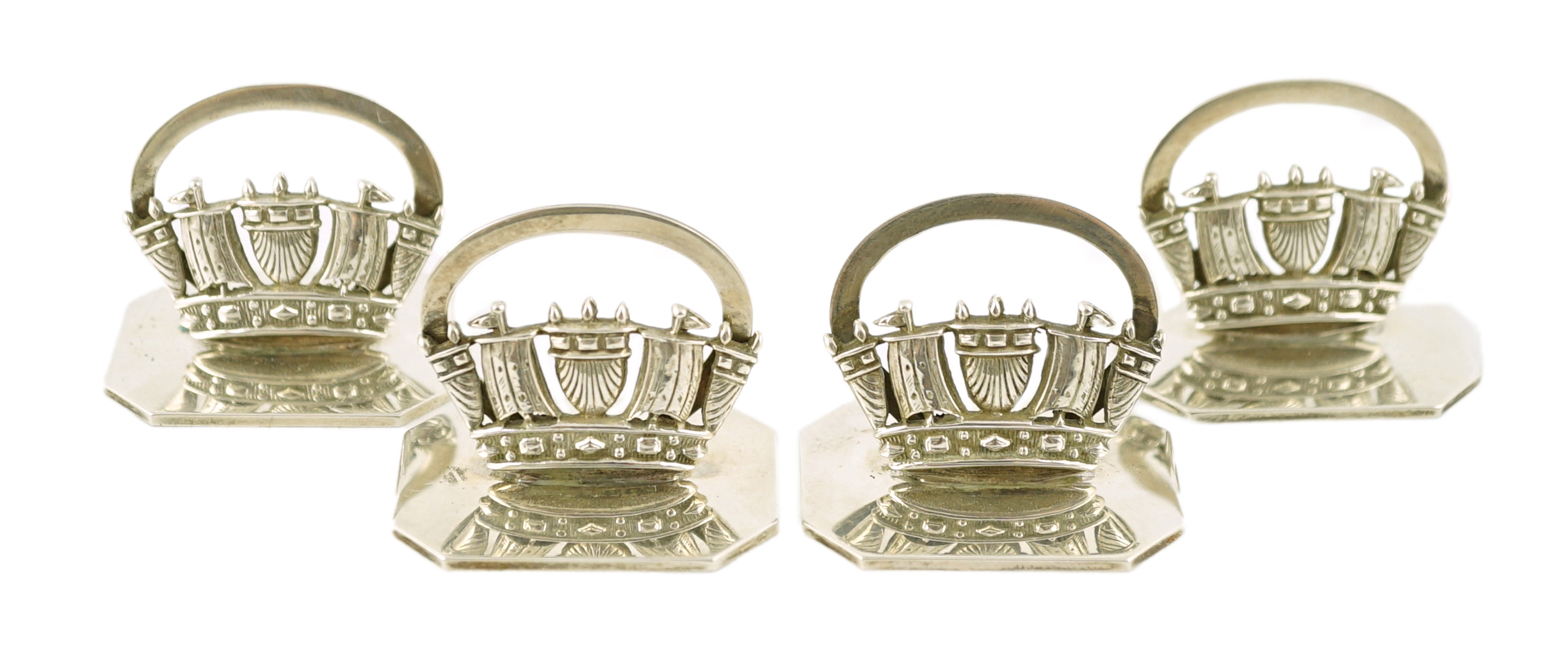 A set of four George V silver Royal Navy & Merchant Services menu holders, by John William Barrett                                                                                                                          