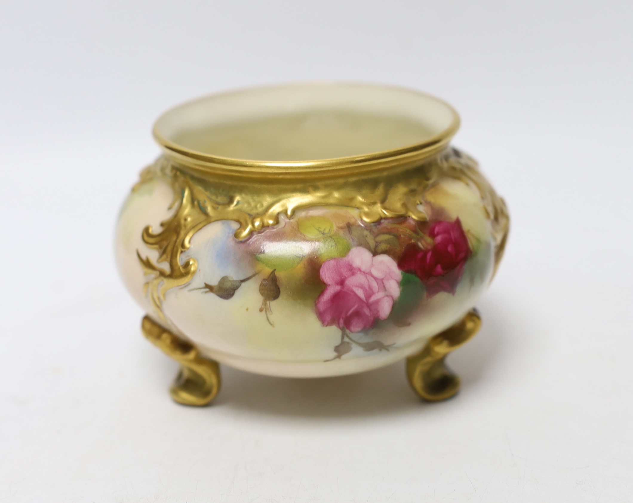 A Royal Worcester vase painted with roses, signed E M Fildes, 8cm high                                                                                                                                                      