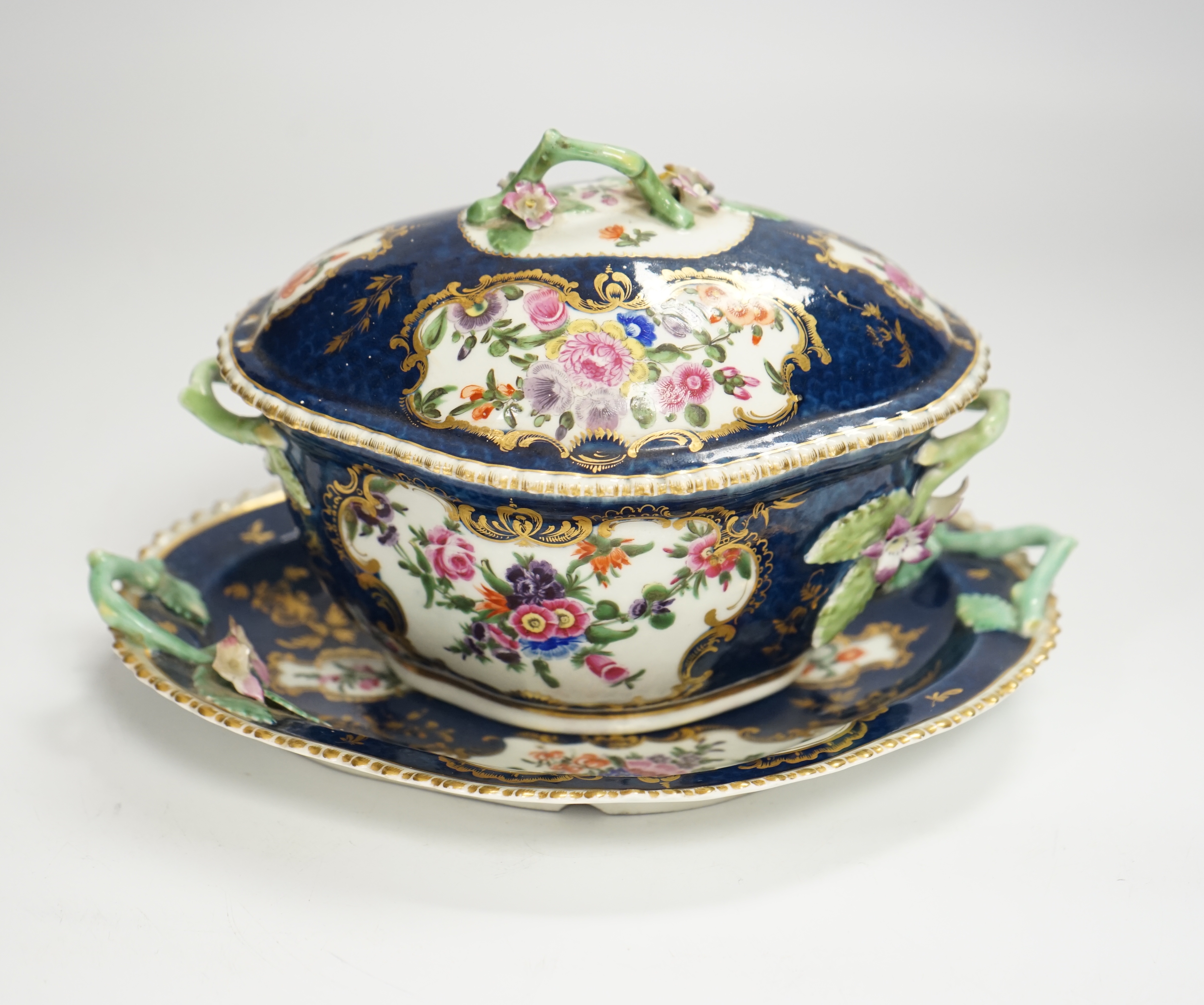 A Worcester scale blue tureen and cover on stand, c.1765-70, 21cm wide                                                                                                                                                      