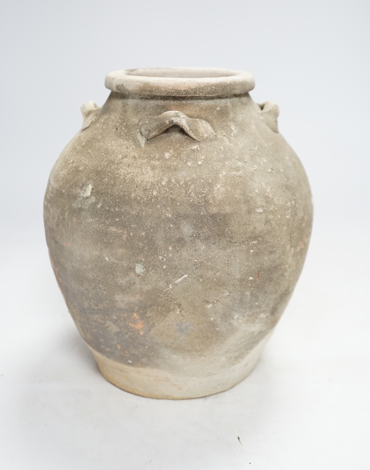 A Chinese pottery jar, Tang Dynasty, 20.5cm high                                                                                                                                                                            