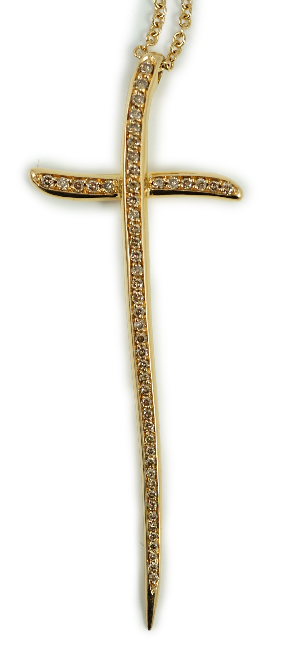 A modern Italian Gavello 750 yellow metal and pave set diamond cross pendant, 77mm, on a 750 yellow metal chain, 40cm, gross weight 14.5 grams.                                                                             