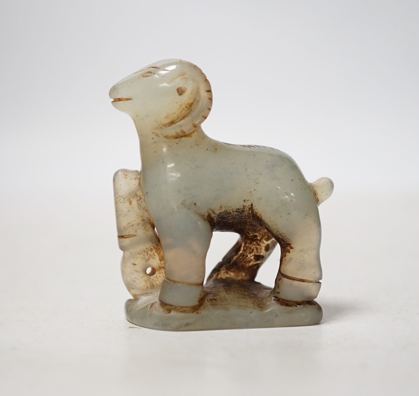 A carved bowenite jade in the form of a ram, 5.5cm high                                                                                                                                                                     