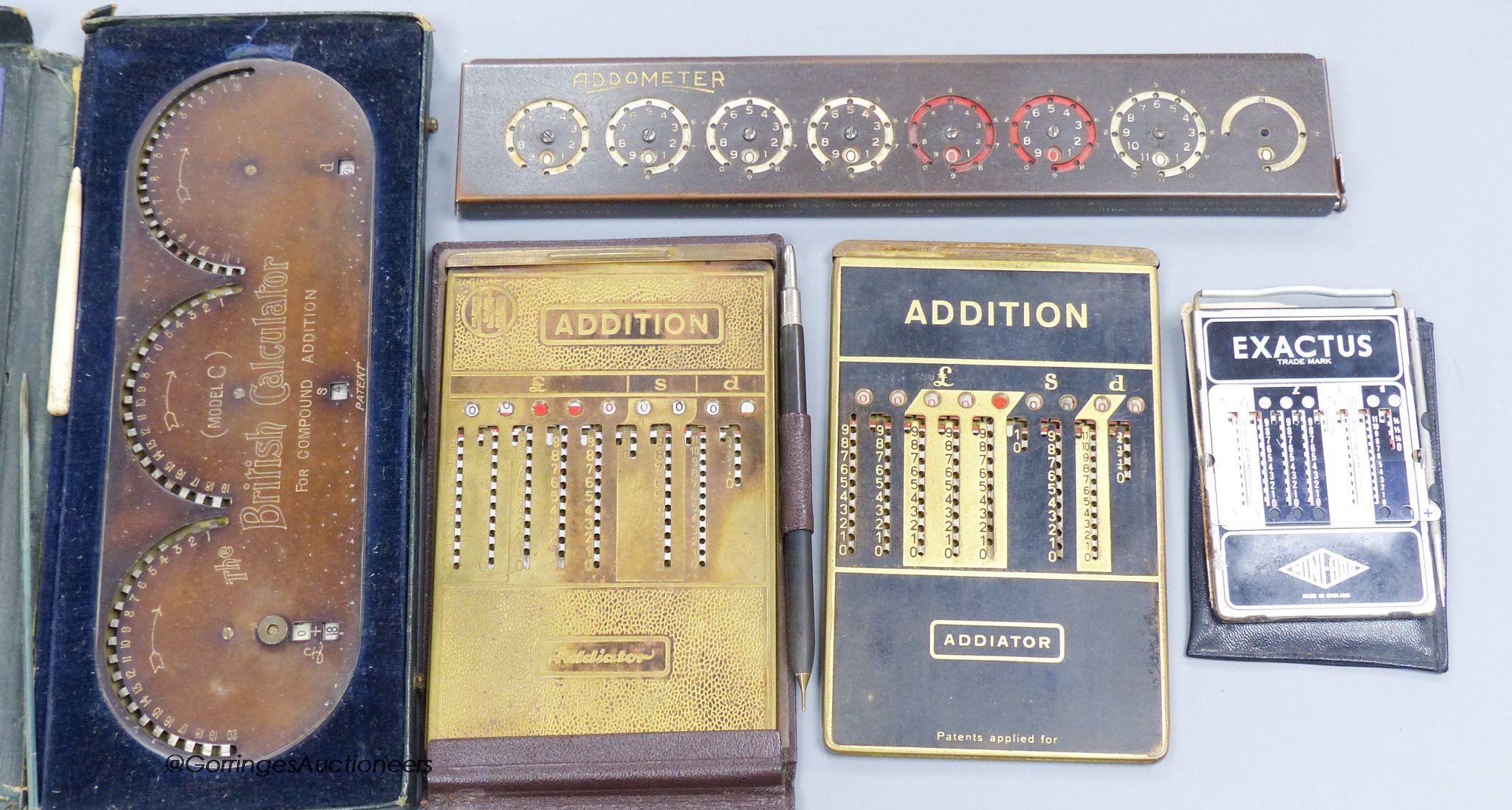 Five various analogue calculators                                                                                                                                                                                           