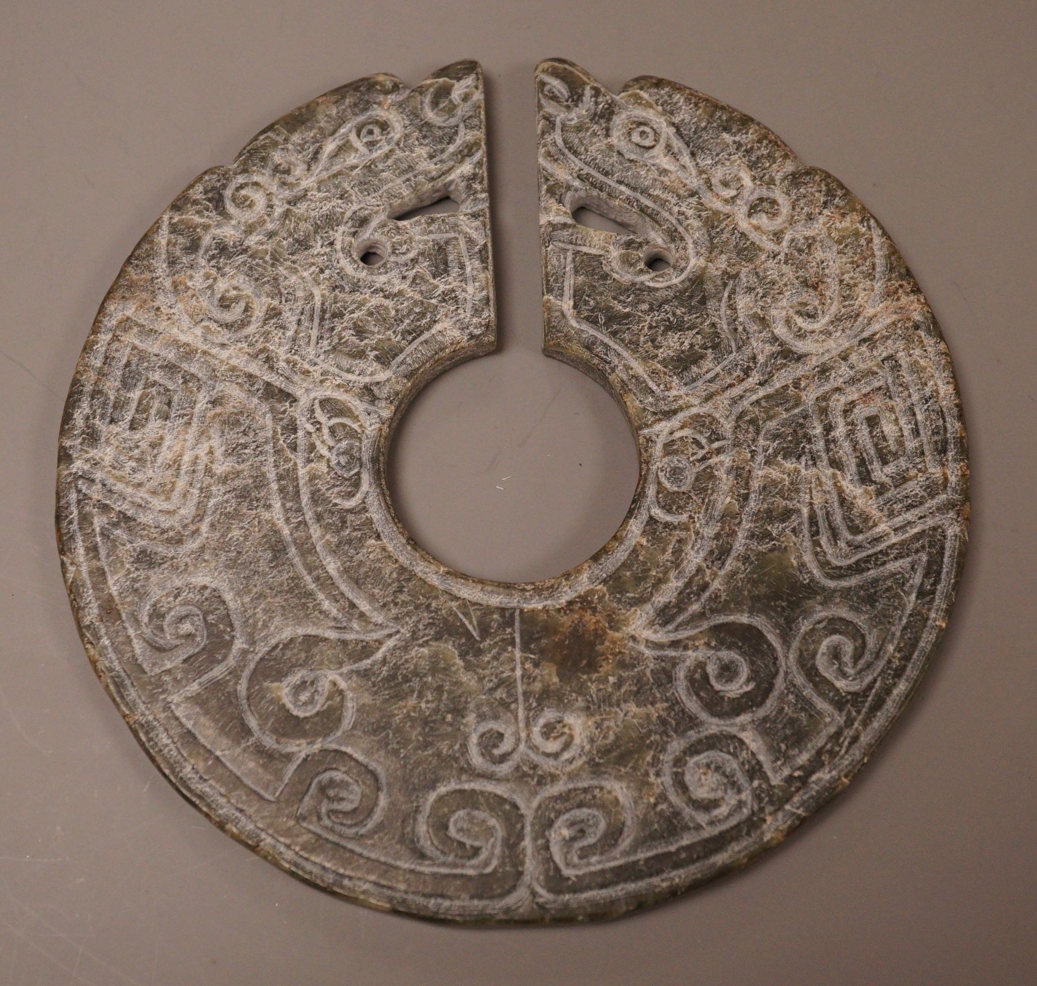 A Chinese stone huang disc                                                                                                                                                                                                  