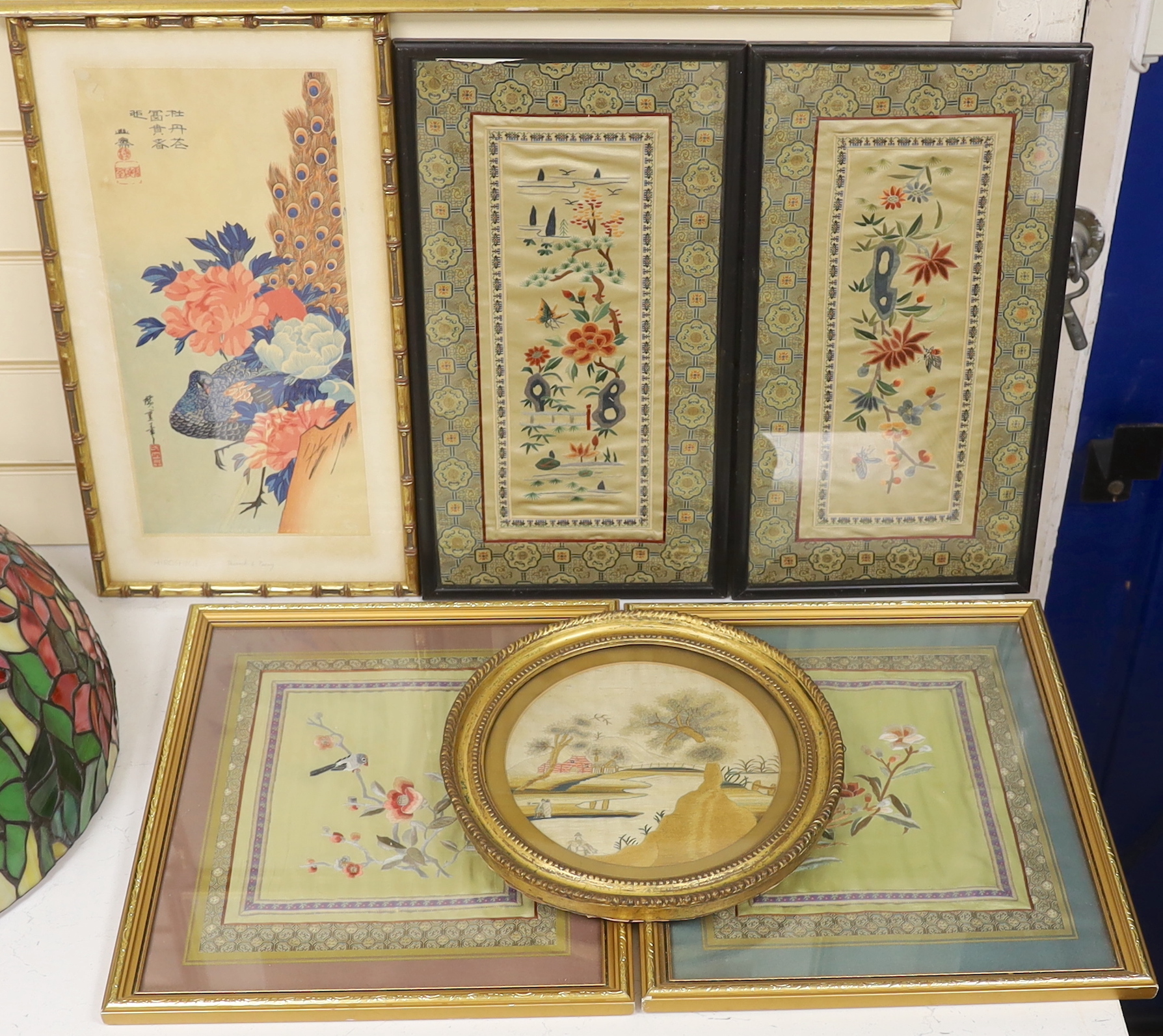 Two pairs of framed 20th century Chinese silk embroideries, two using Chinese knotting, a Hiroshima ‘Peacock and Peony’ print and a circular, figural landscape embroidery (6)                                              