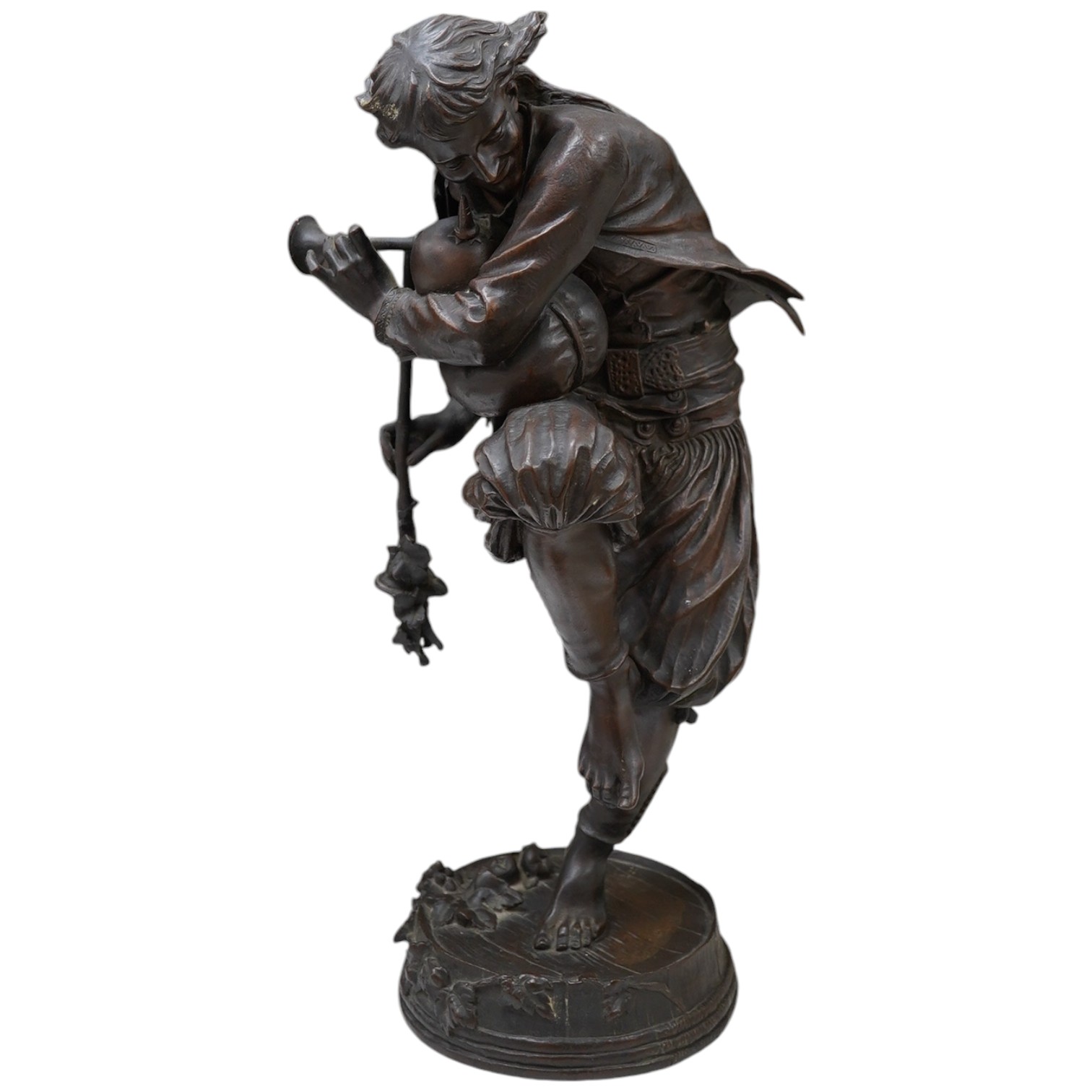 After Charles Lebourg (French, 1829-1906), a bronze sculpture, ‘The Piper’, 44cm high. Condition - good                                                                                                                     