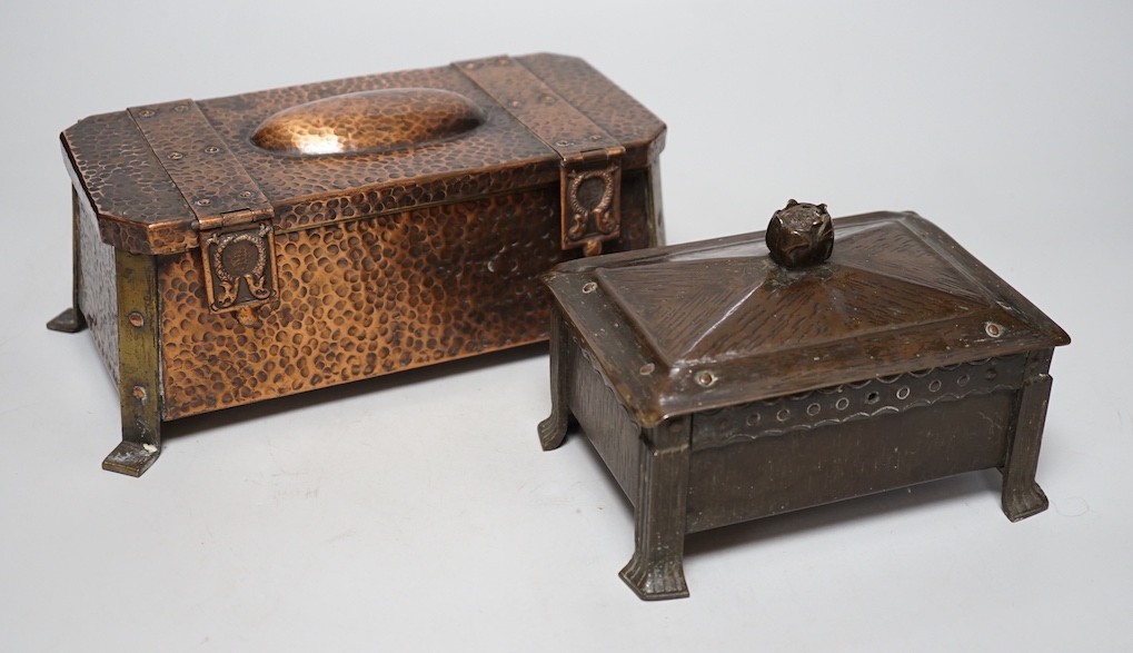 An Arts & Crafts hammered copper and brass mounted casket 23cms wide x 9cms high, together with a smaller similar casket                                                                                                    