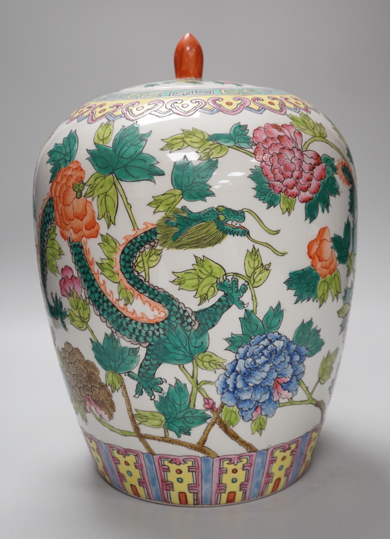 A Chinese famille rose ’dragon’ jar and cover, approximately 30cms high                                                                                                                                                     