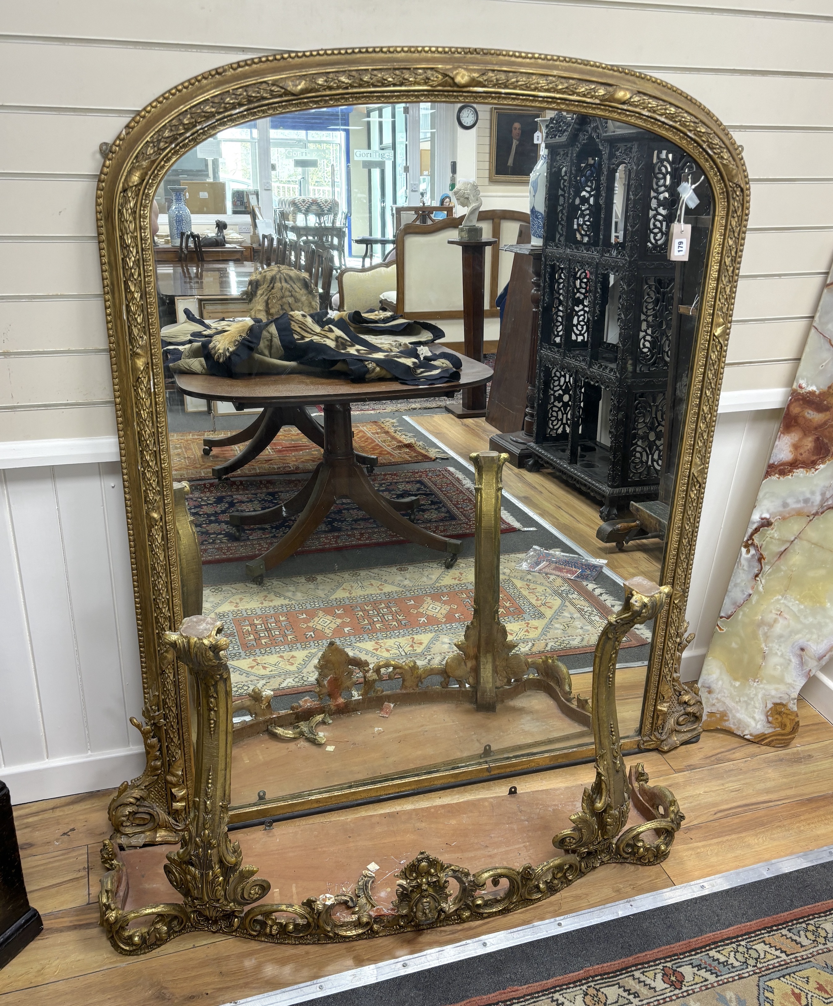 A Victorian giltwood and composition overmantel mirror, width 146cm, height 159cm                                                                                                                                           