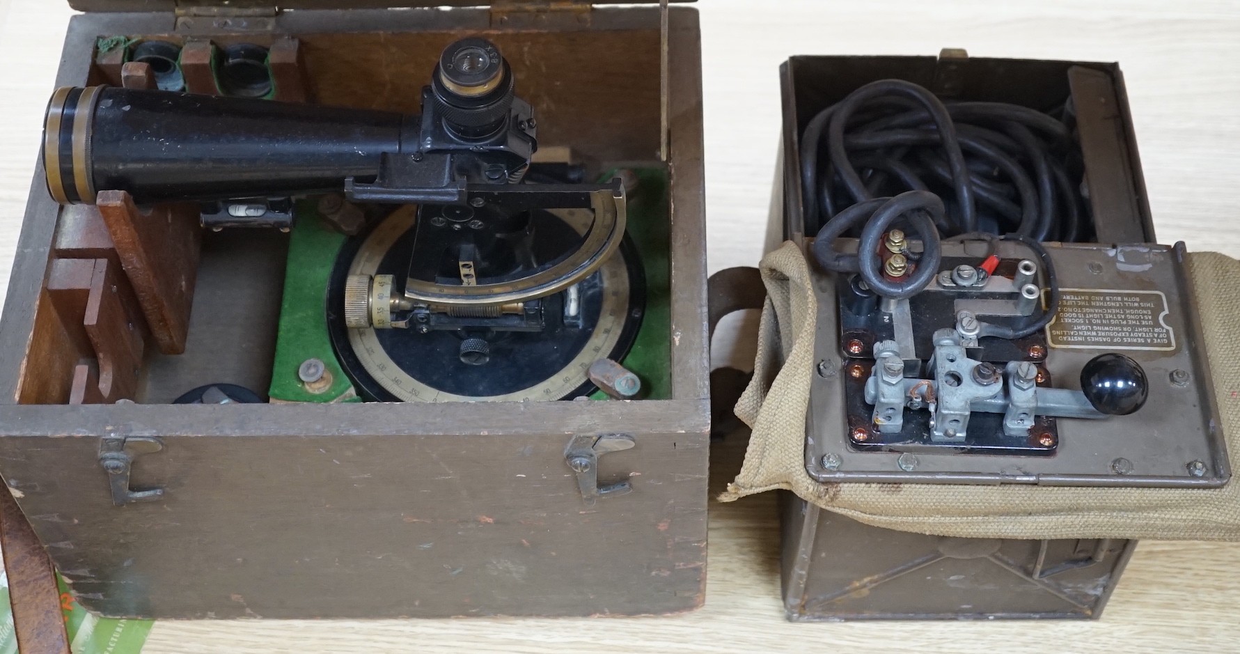 A WW2 range-finder, 33cms wide x 33cms high, together with a morse code short range daylight signalling set, both cased                                                                                                     
