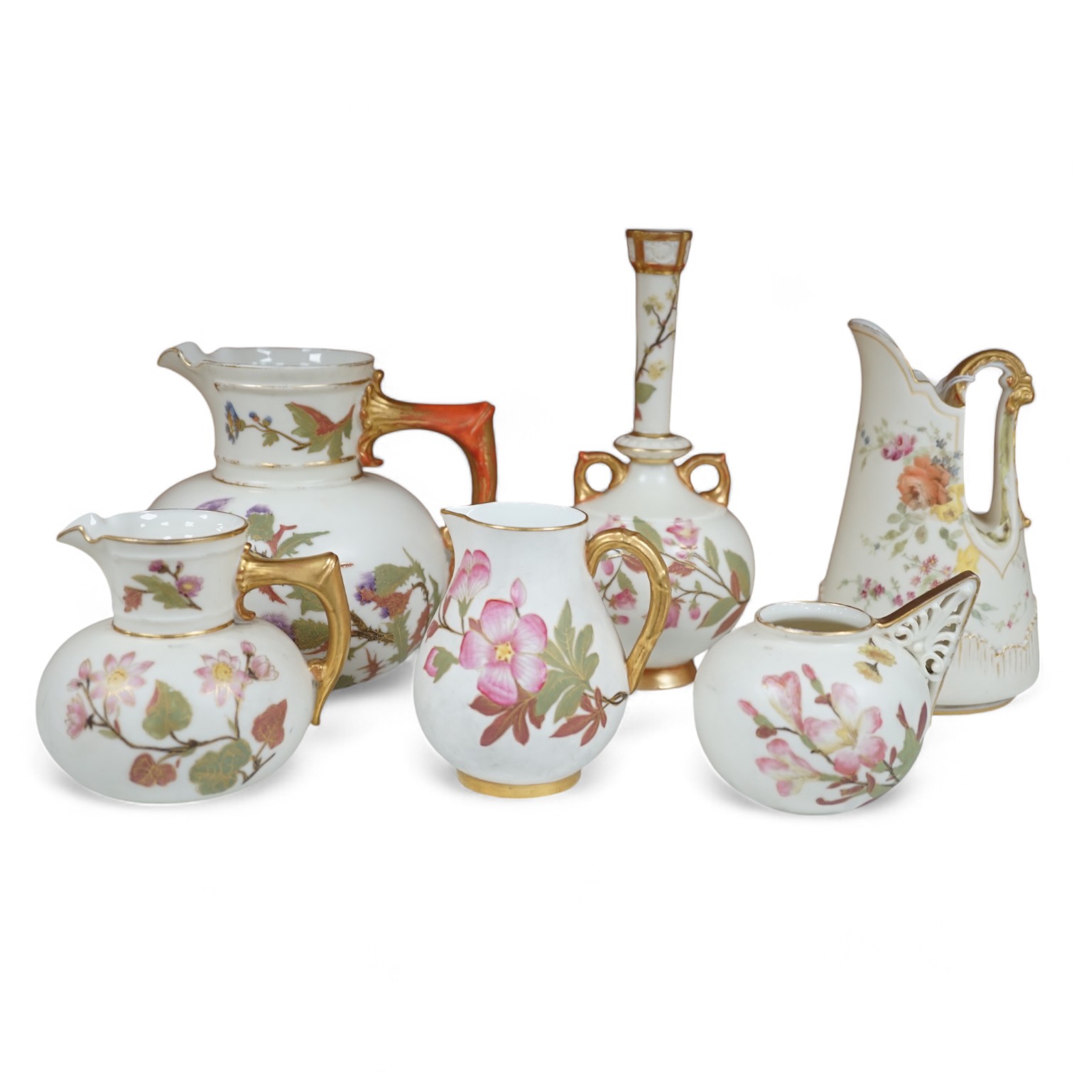 Four Royal Worcester ivory ground and gilt decorated vases and a handled posy pot and tall stemmed vase, 18.5cm high. Condition - some gilt decoration worn                                                                 