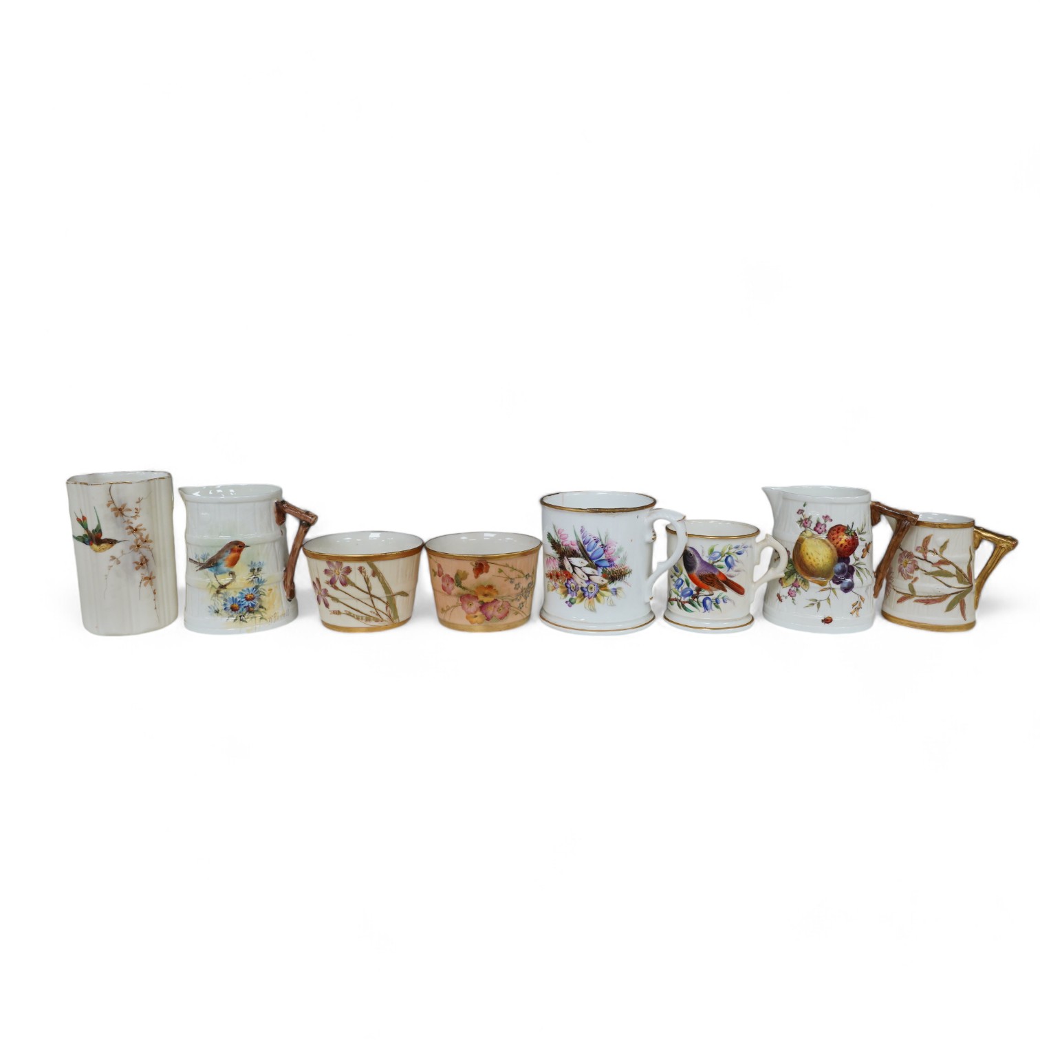 A group of Royal Worcester to include three jugs, two mugs, and two pots, etc. (8). Condition - some damage                                                                                                                 