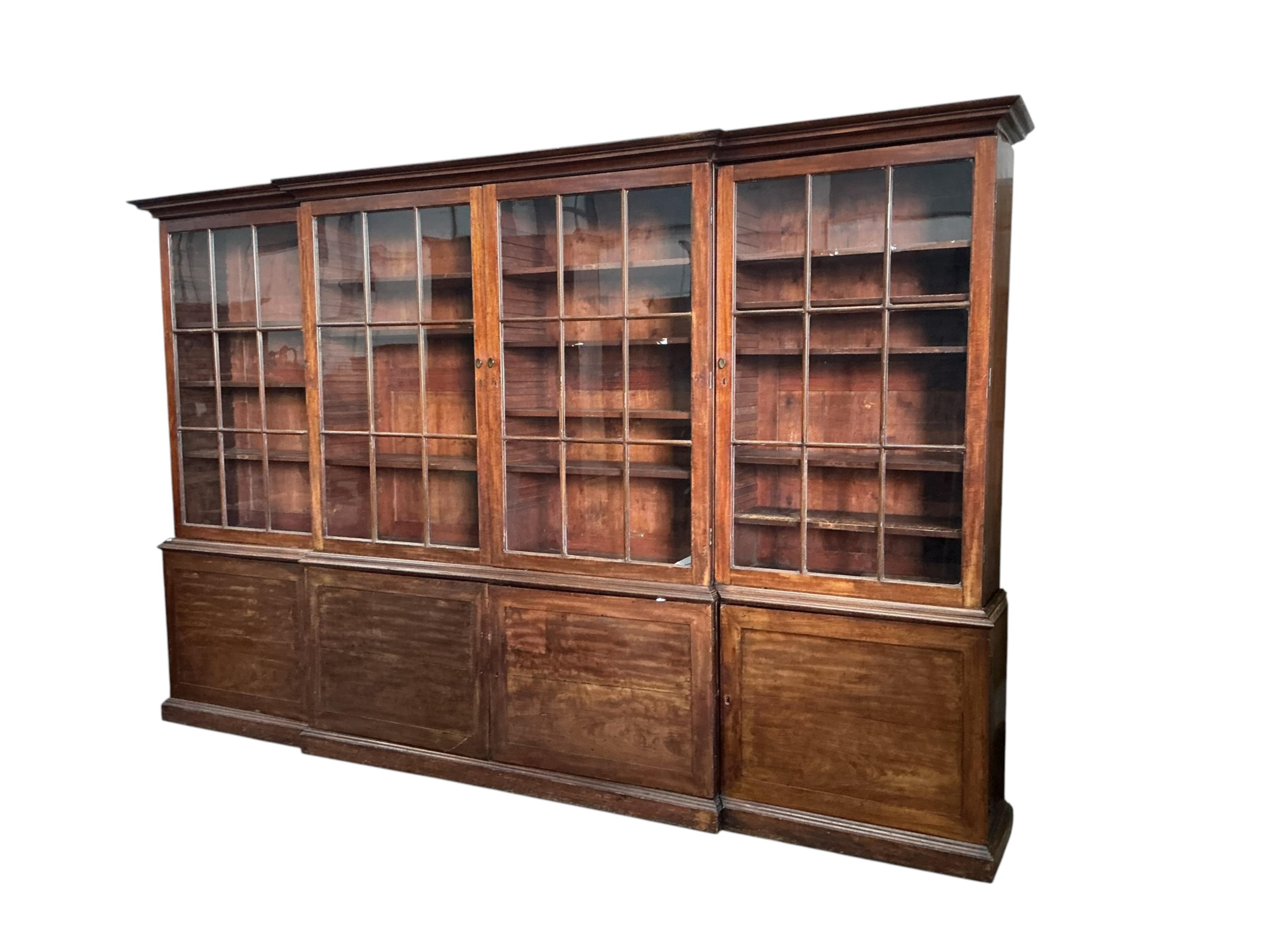 A 19th century mahogany breakfront library bookcase, width 365cm, depth ...