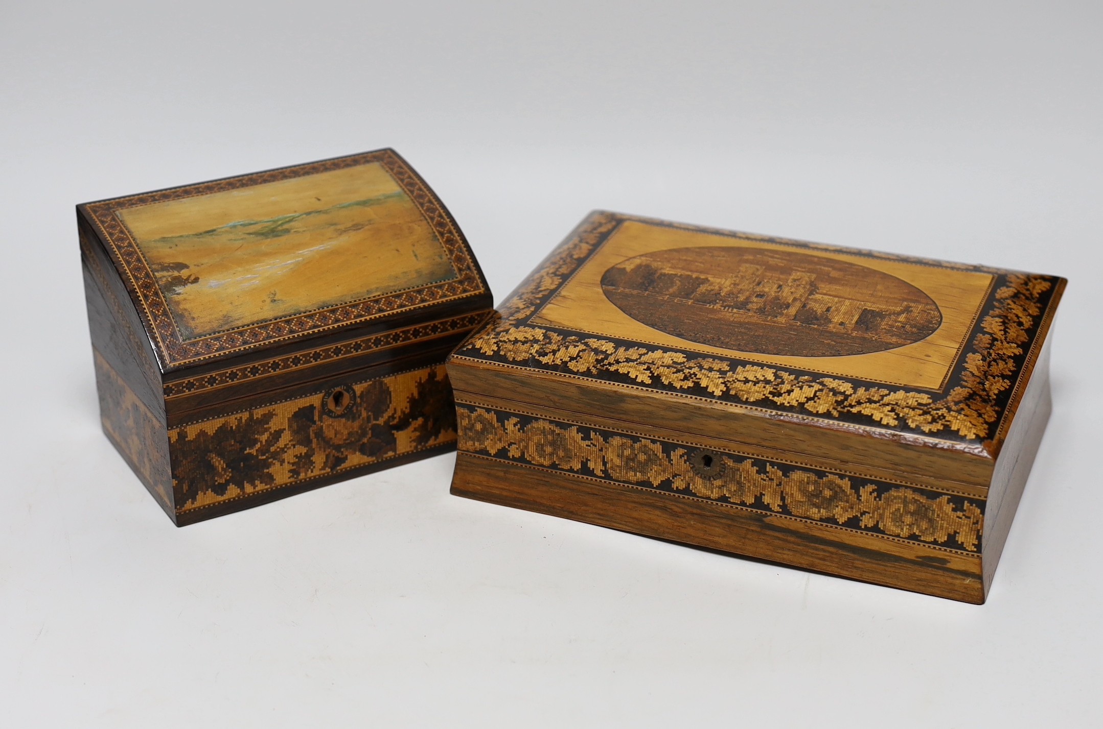 A Tunbridgeware rosewood games box with view of Bodiam Castle, a brush and a stationery box, largest 24cm wide, 18cms deep                                                                                                  