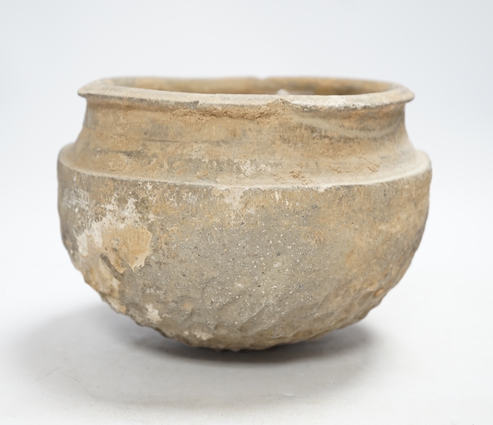 A Chinese grey pottery bowl, probably Warring States, 19cm diameter                                                                                                                                                         