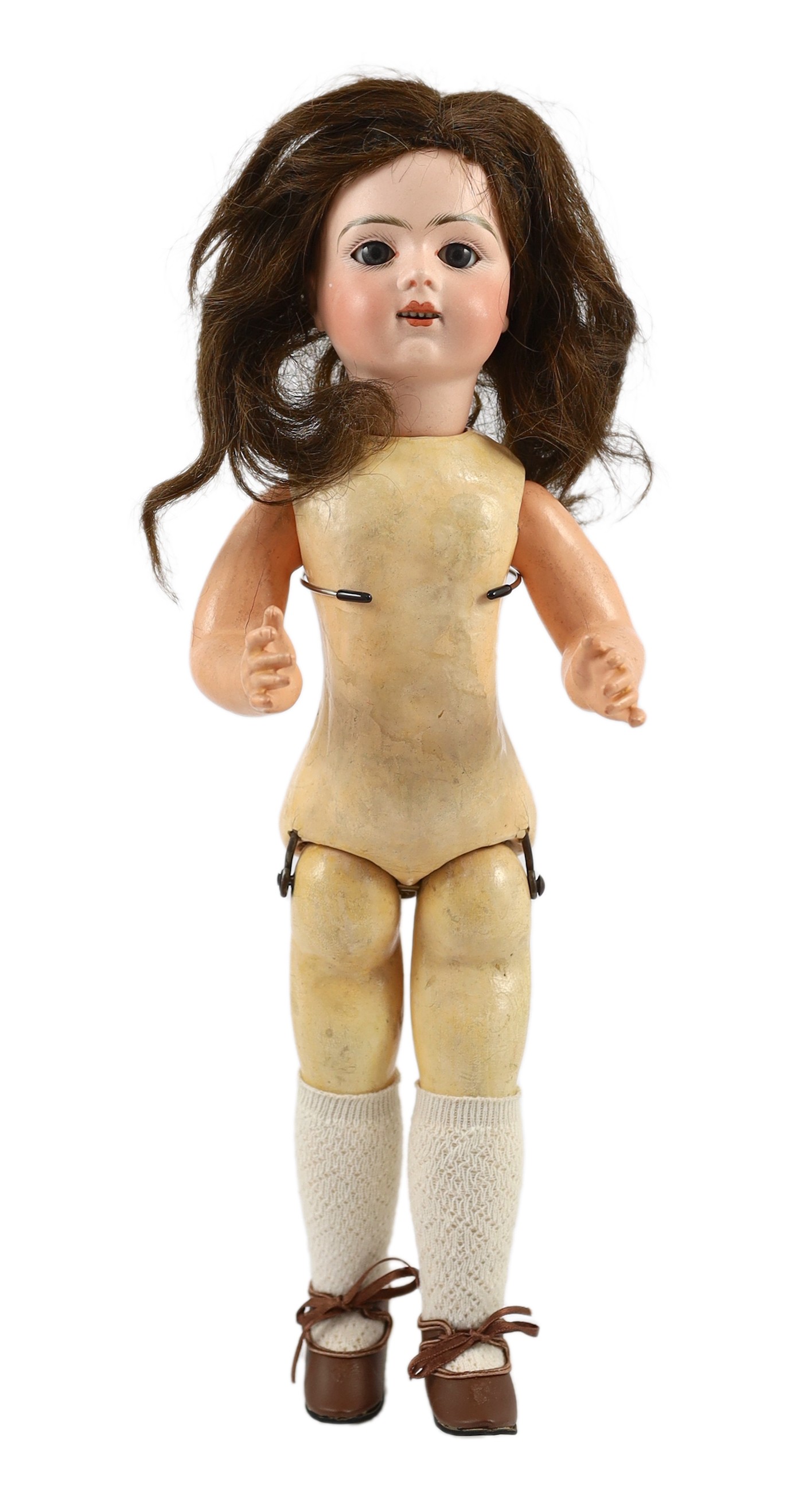 A Bru Jeune R. bisque Walking doll, French, circa 1890, 16in.                                                                                                                                                               