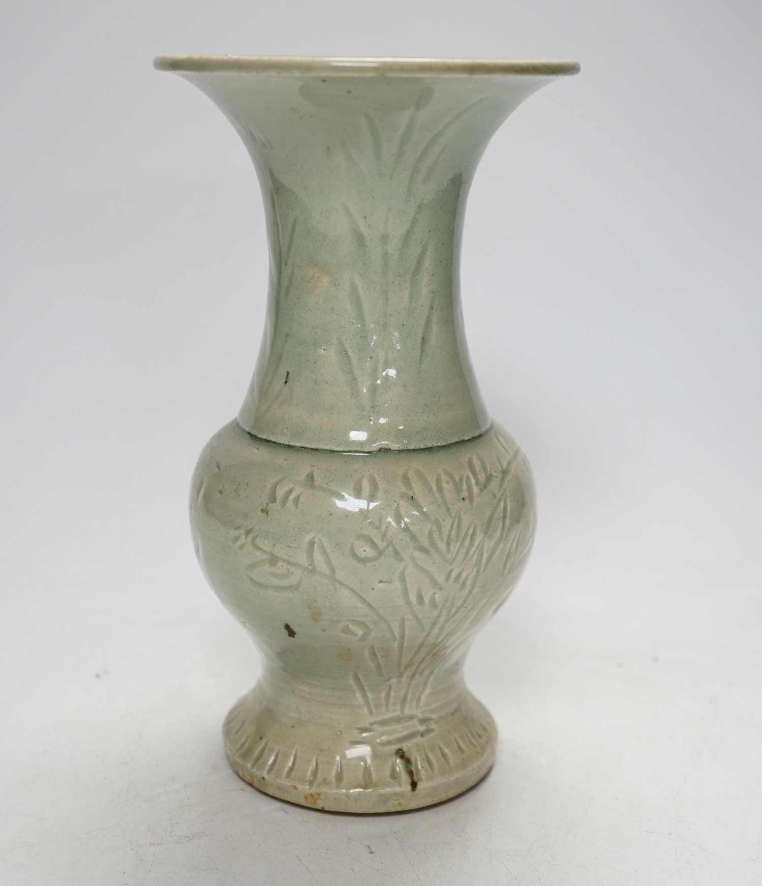 A Chinese celadon small yen-yen vase, probably Yuan dynasty, 23cm                                                                                                                                                           