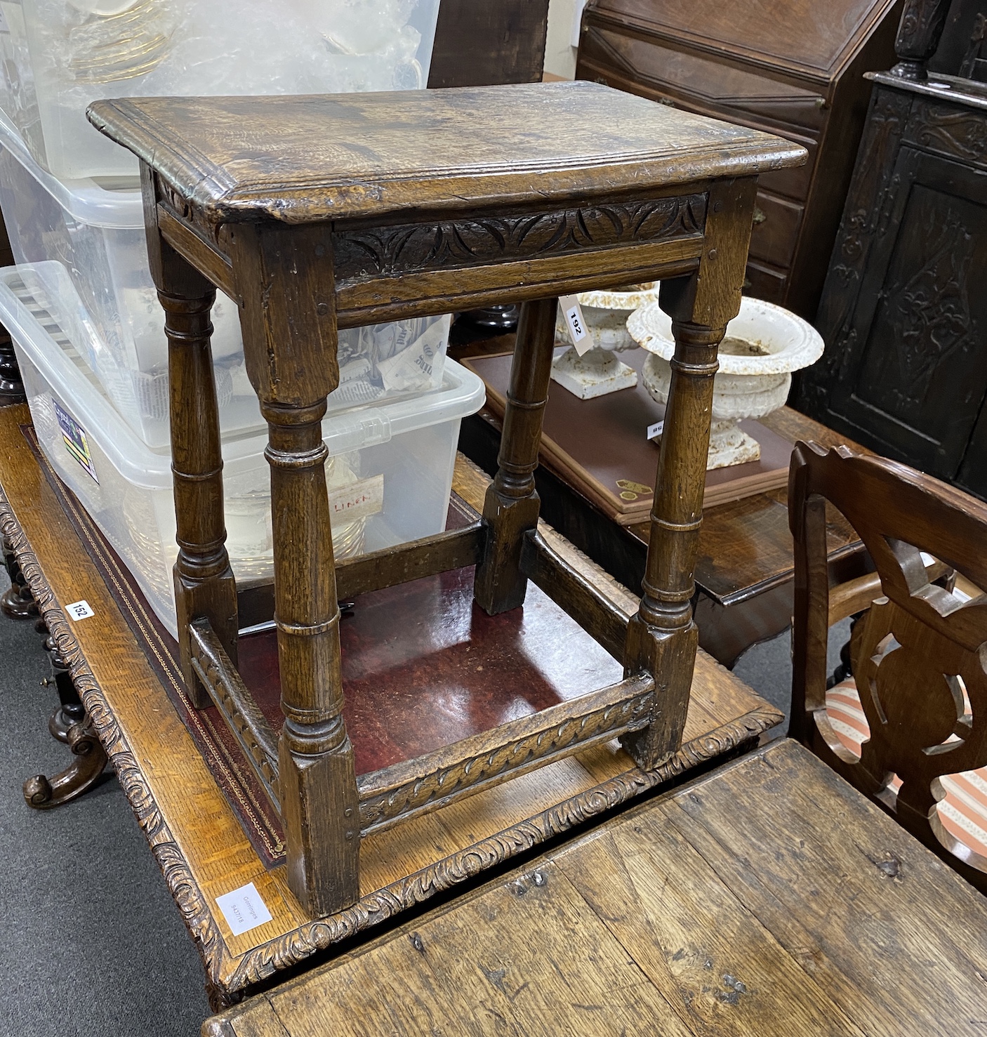 An 18th century oak joint stool width 44cms, depth 28cms, height 57cms.                                                                                                                                                     