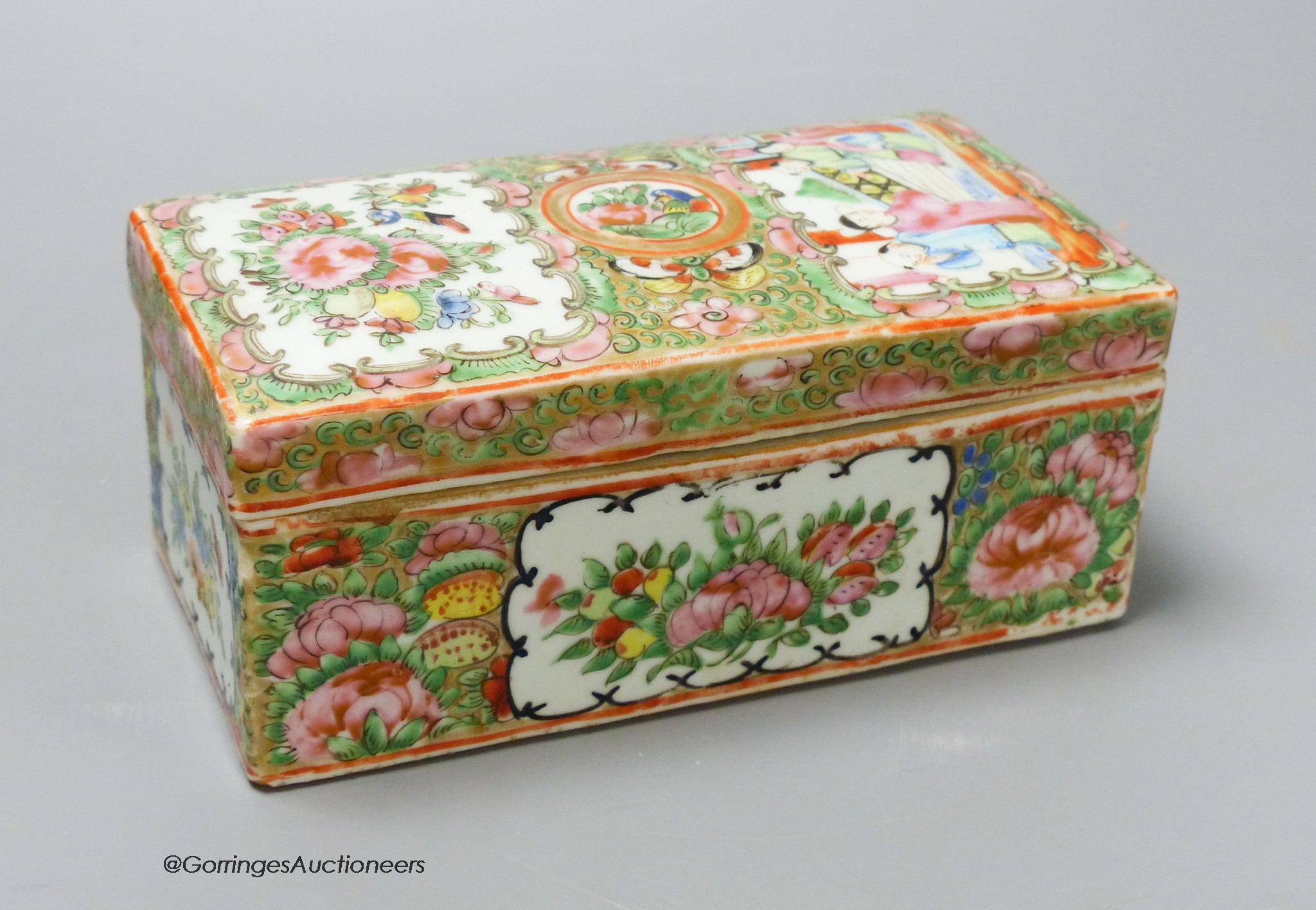 A Chinese famille rose pen box and cover, c.1900, 18cm wide                                                                                                                                                                 