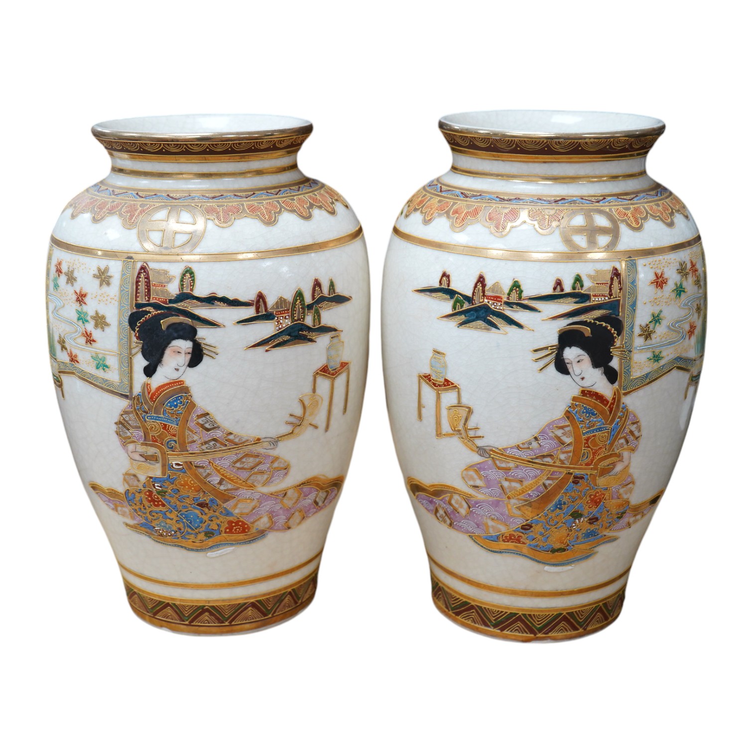 A pair of 20th century Japanese satsuma pottery vases, 32cm high. Condition - crazing throughout                                                                                                                            