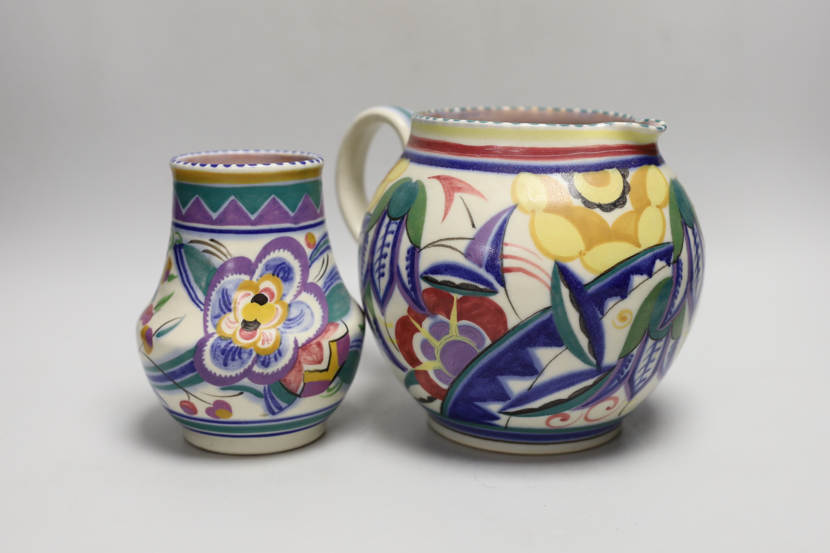 A 1930’s Poole Pottery polychrome jug and vase, jug 16cm                                                                                                                                                                    