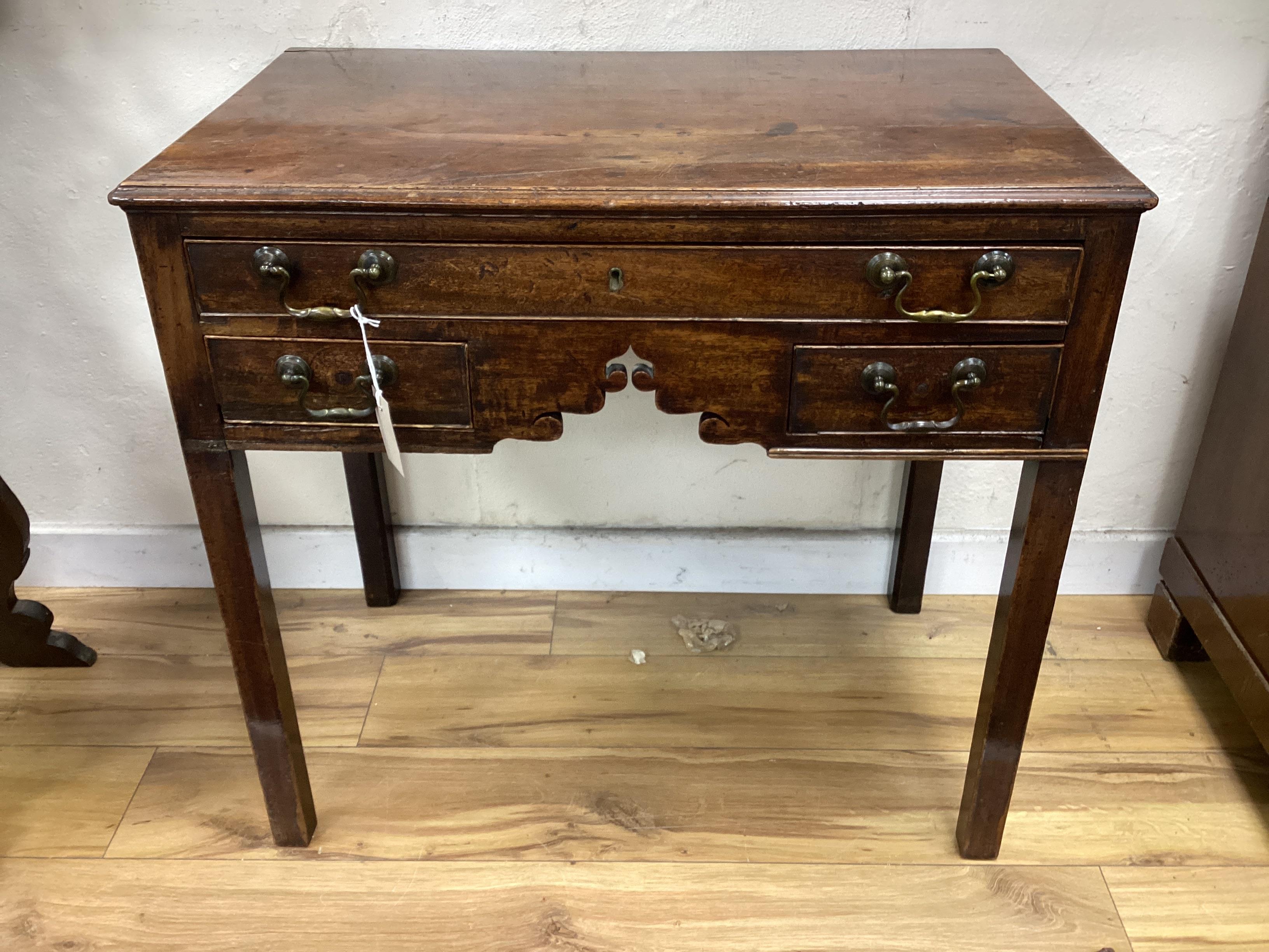 A George III mahogany three drawer side table width 75cm, depth 46cm, height 70cm                                                                                                                                           