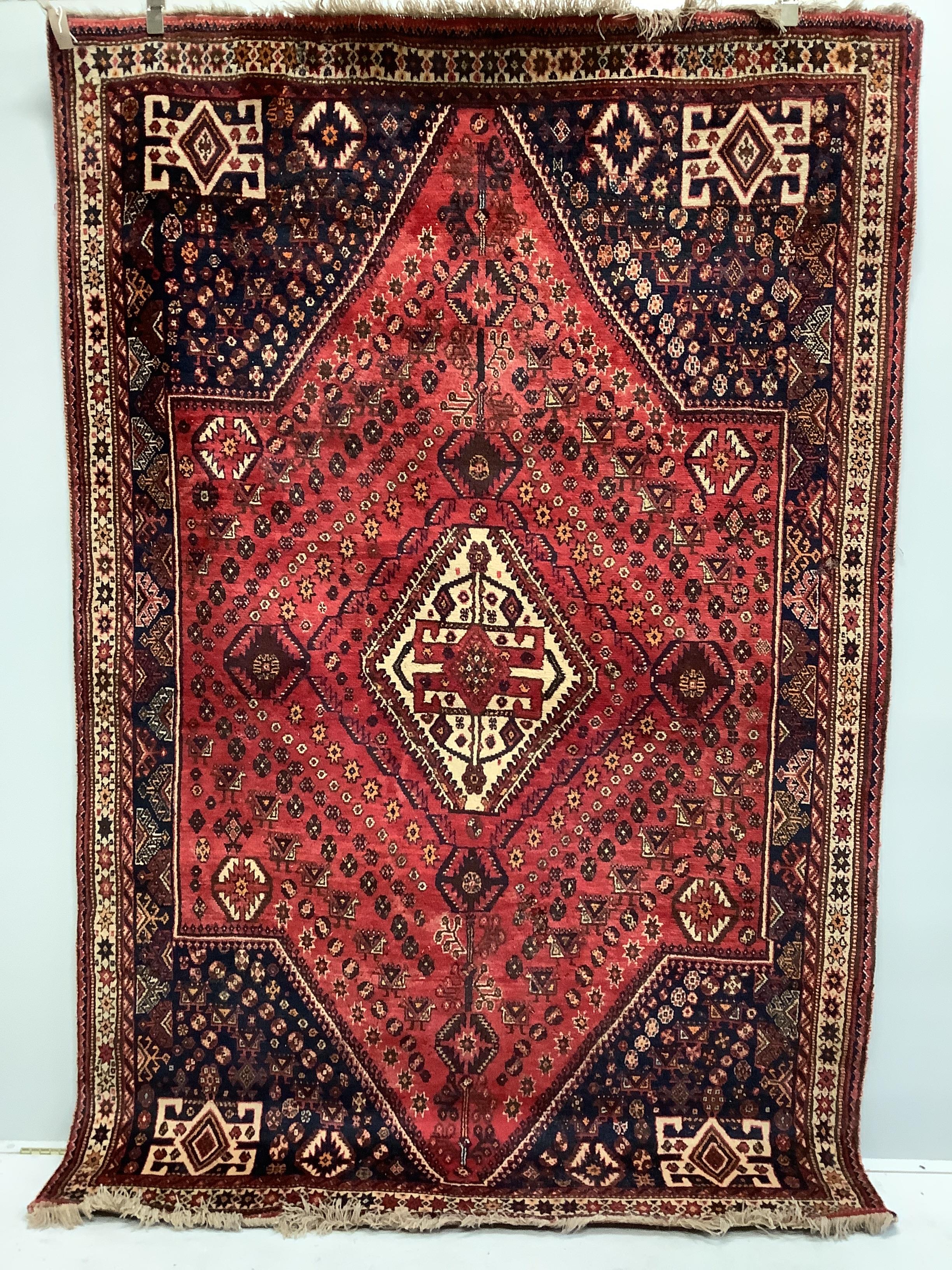 A North West Persian red ground carpet, 254 x 170cm                                                                                                                                                                         
